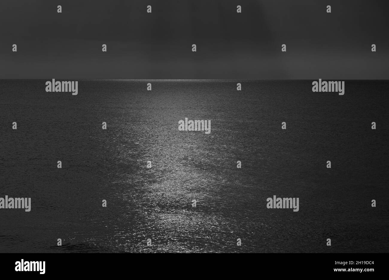 Sun reflecting on calm Black and White Stock Photos & Images - Alamy