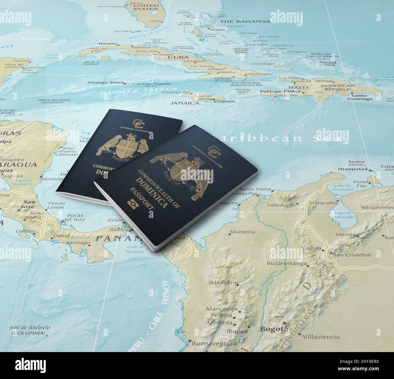 Passports of two Caribbean states Dominica on a map of the Caribbean Sea Stock Photo