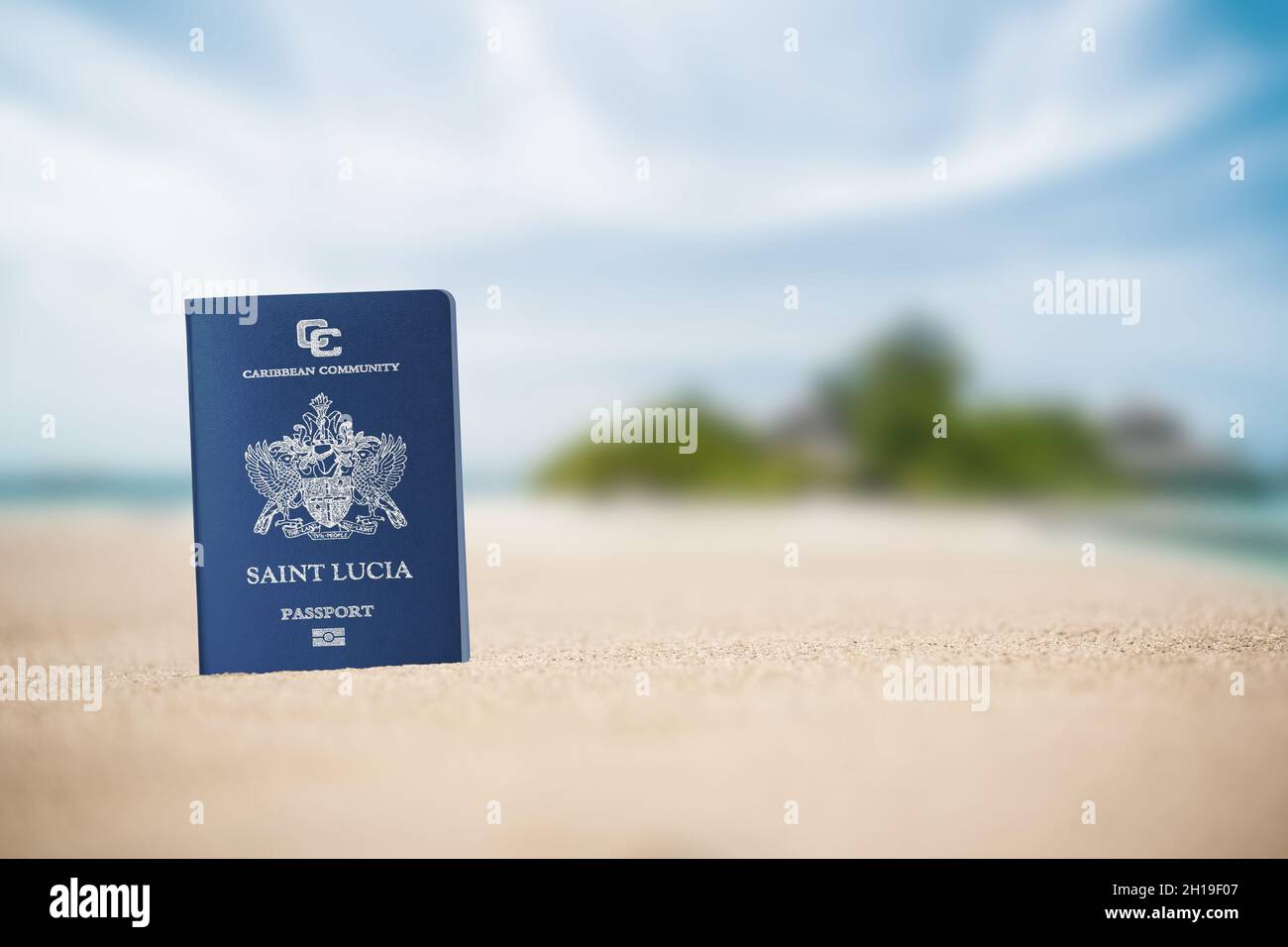 saint Lucia passport on the beach sand ,Space for writing Stock Photo