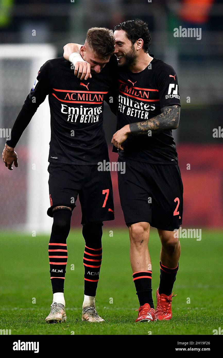 Milan, Italy. 16 October 2021. Samu Castillejo (L) of AC Milan celebrates the victory with Davide Calabria of AC Milan at the end of the Serie A football match between AC Milan and Hellas Verona FC. Credit: Nicolò Campo/Alamy Live News Stock Photo