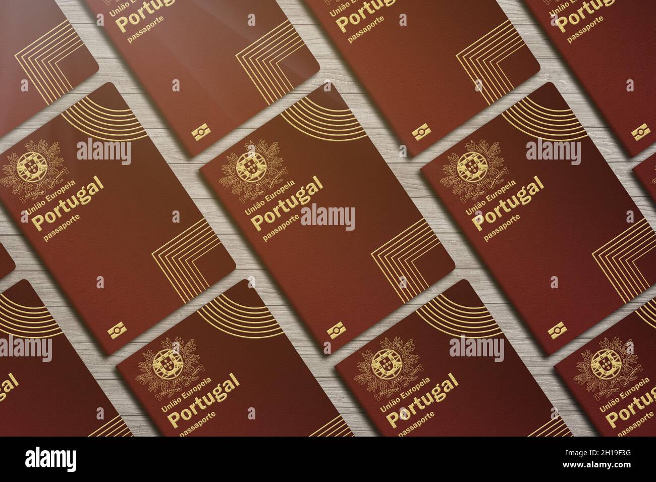 Passports of the European  union of Portugal, top view, on a wooden table ,Horizontal arrangement Stock Photo