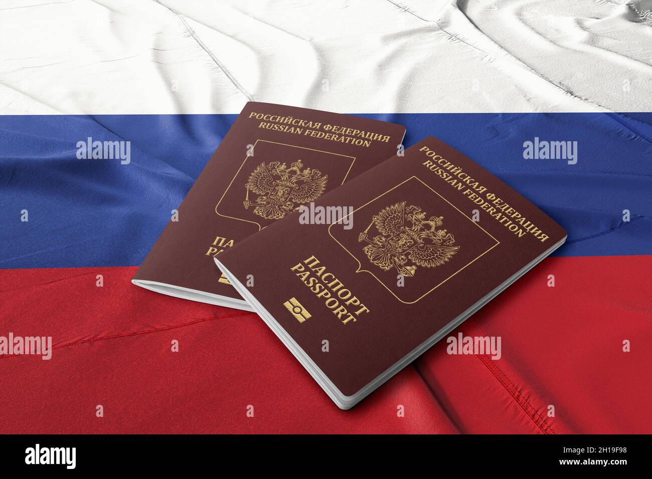 Russian passport on the flag of Russia, citizenship by investment Stock Photo Alamy