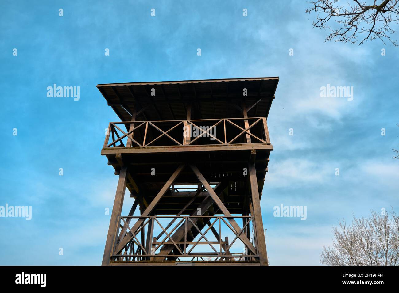 A wooden house made for bird watching in Karacabey floodplain and forest with magnificent blue sky background Stock Photo