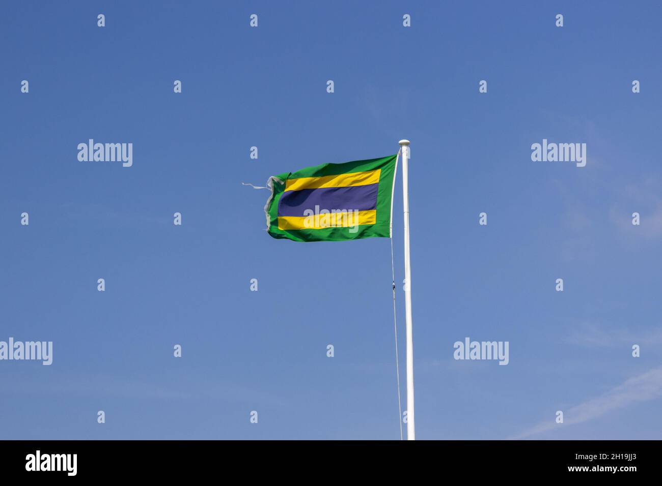 Hilbre island, UK Delta flag, meaning "Keep Clear" flying from a mast