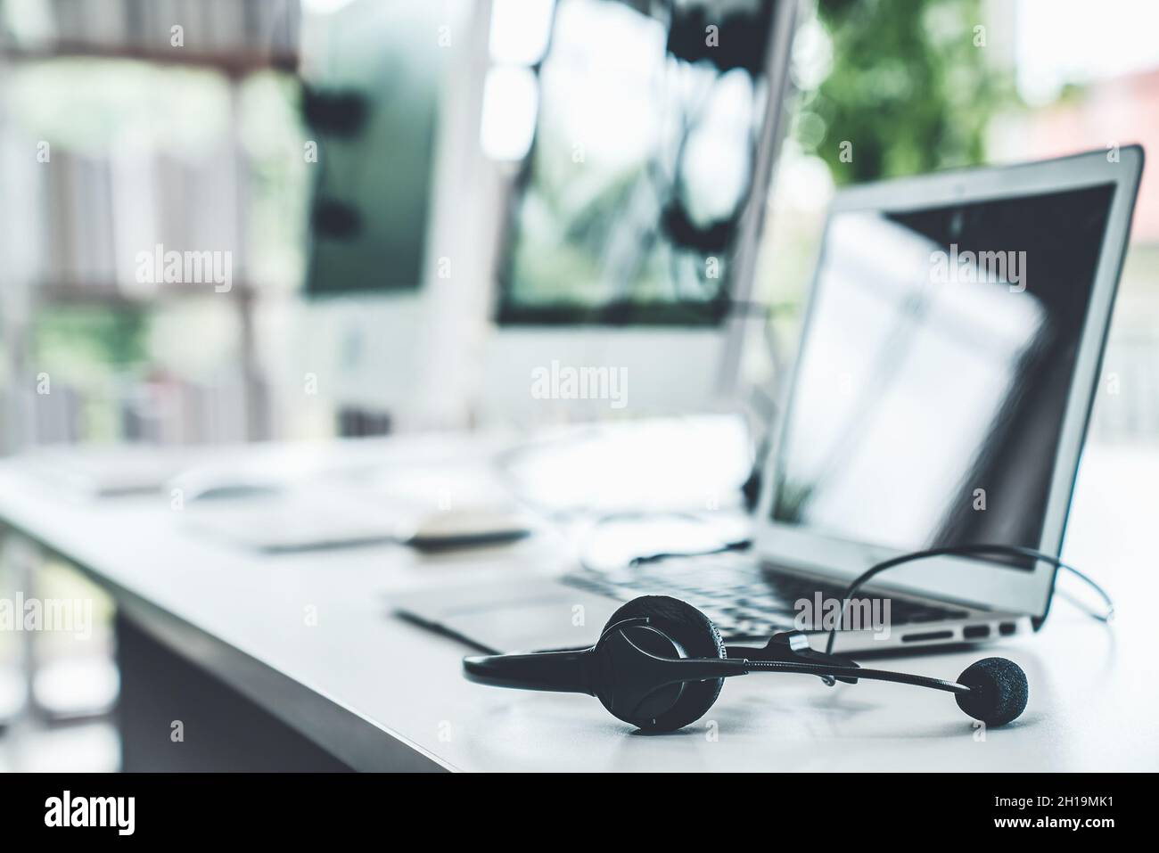 Headset and customer support equipment at call center ready for actively  service . Corporate business help desk and telephone assistance concept  Stock Photo - Alamy