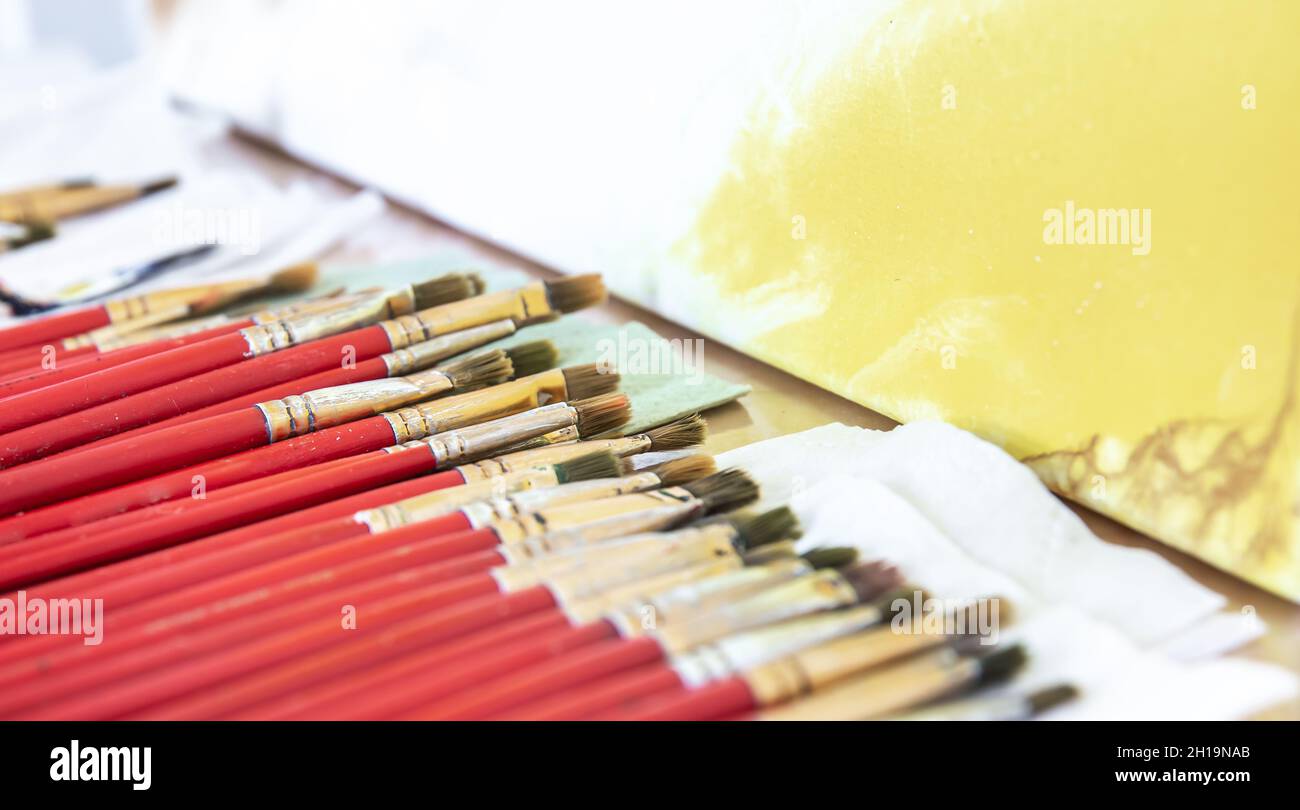 A set of red brushes for painting, closeup Stock Photo Alamy