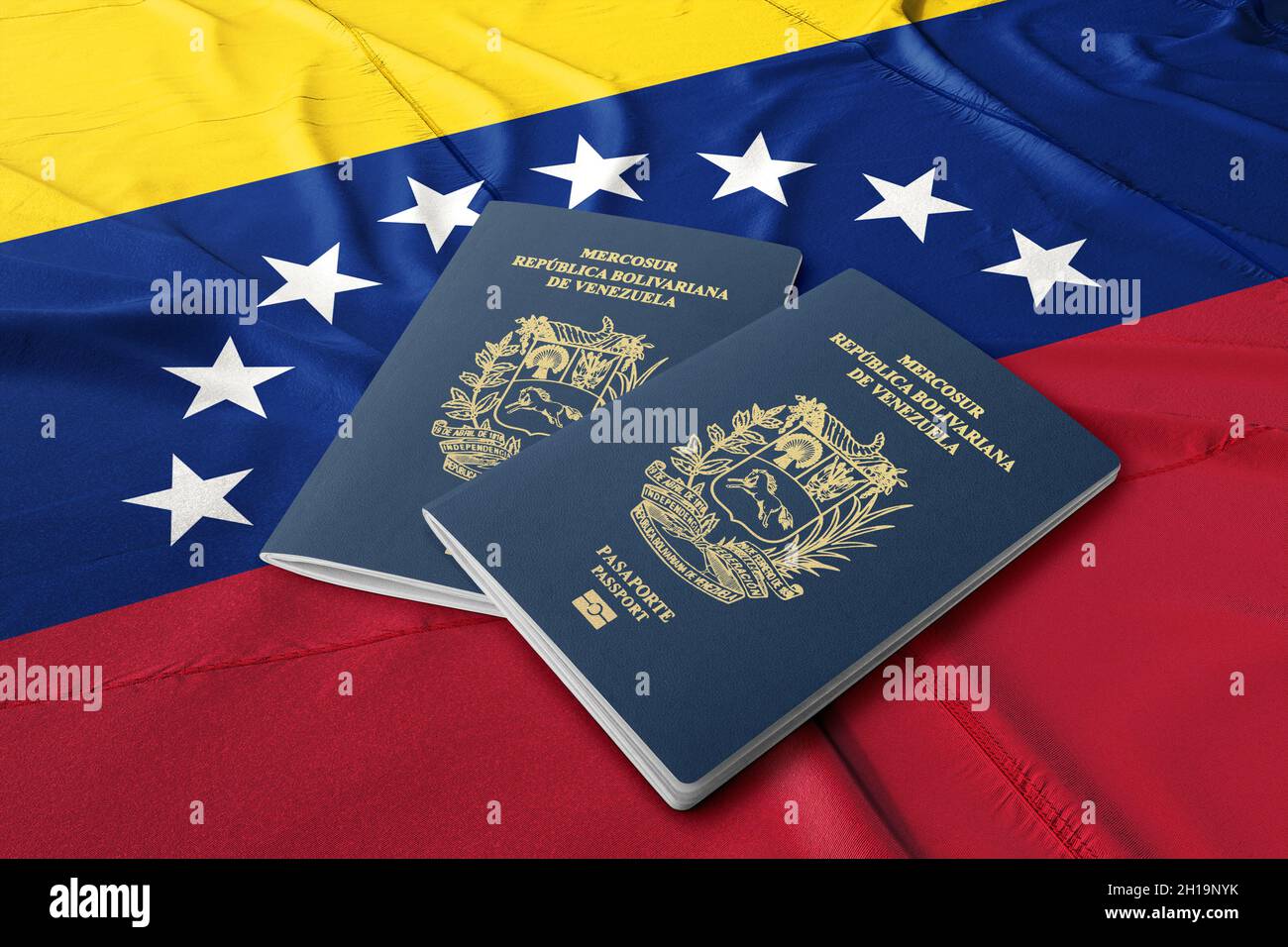 Venezuela passport with the flag of Venezuela Stock Photo