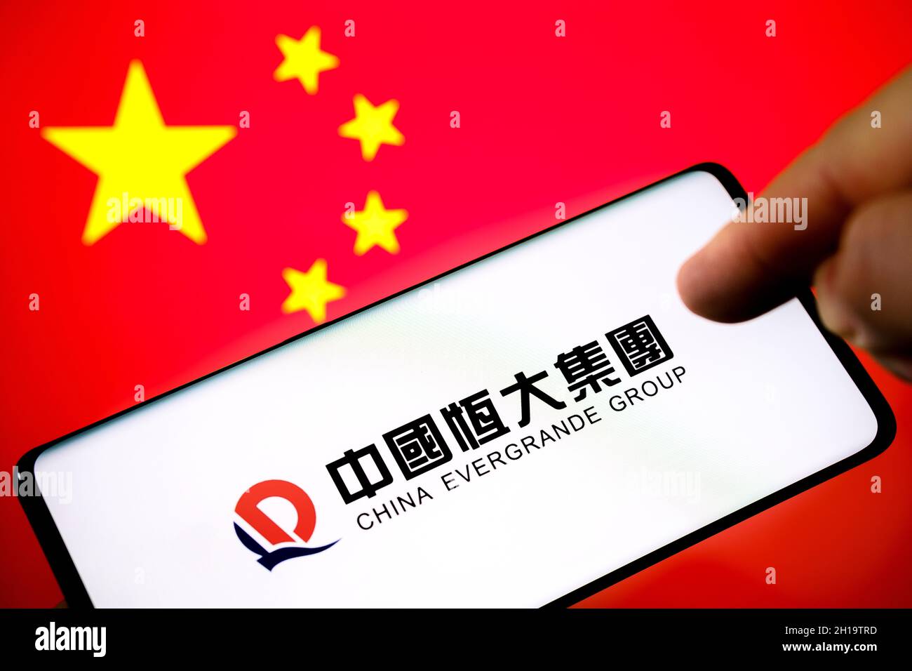 China EVERGRANDE GROUP company logo seen on smartphone and blurred