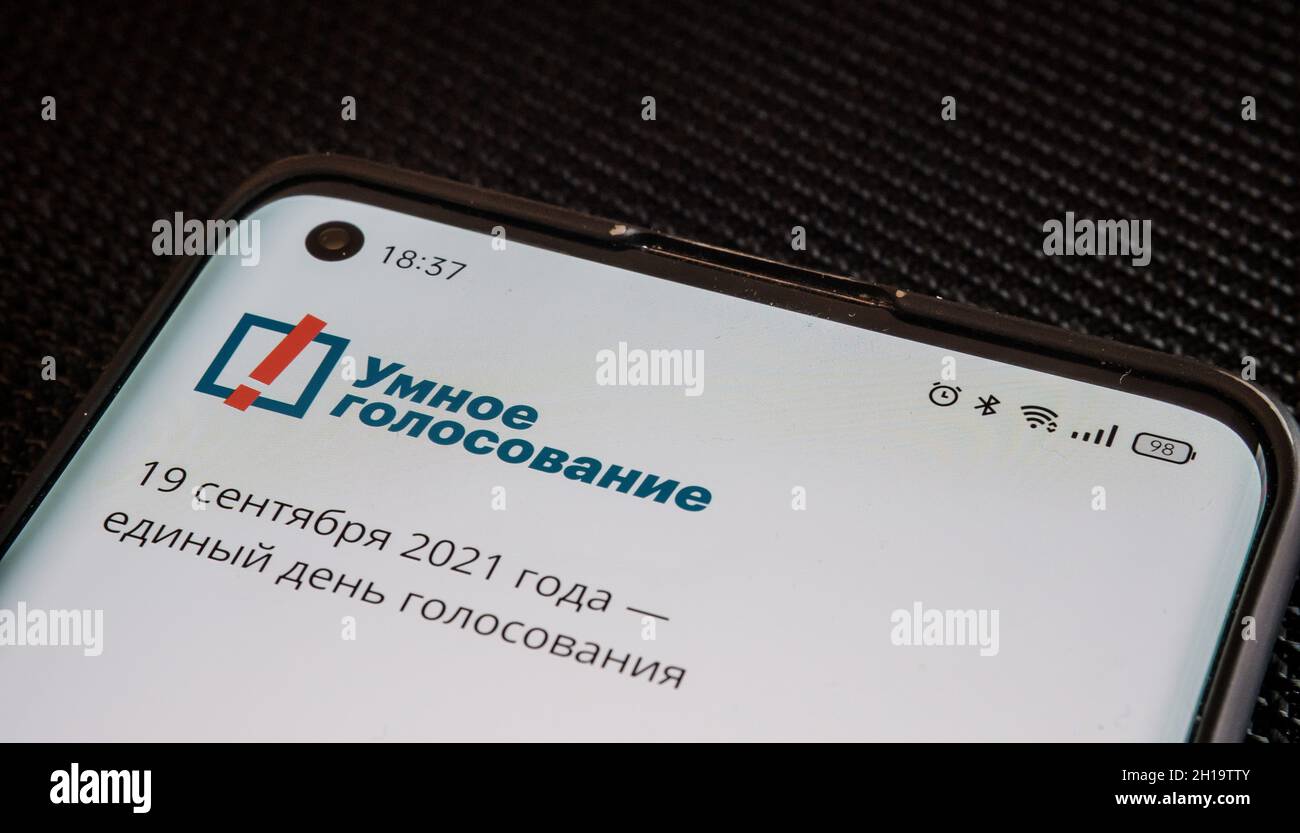 Navalny Smart Voting app login screen seen on smartphone. Text seen in Russian language is translated as 'SMART VOTING', 'September 19th 2021 - 'the o Stock Photo