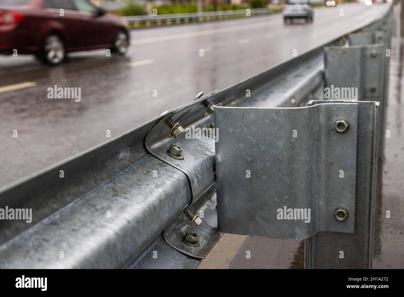 underscrewed nuts and bolts in highway road railing Stock Photo Alamy