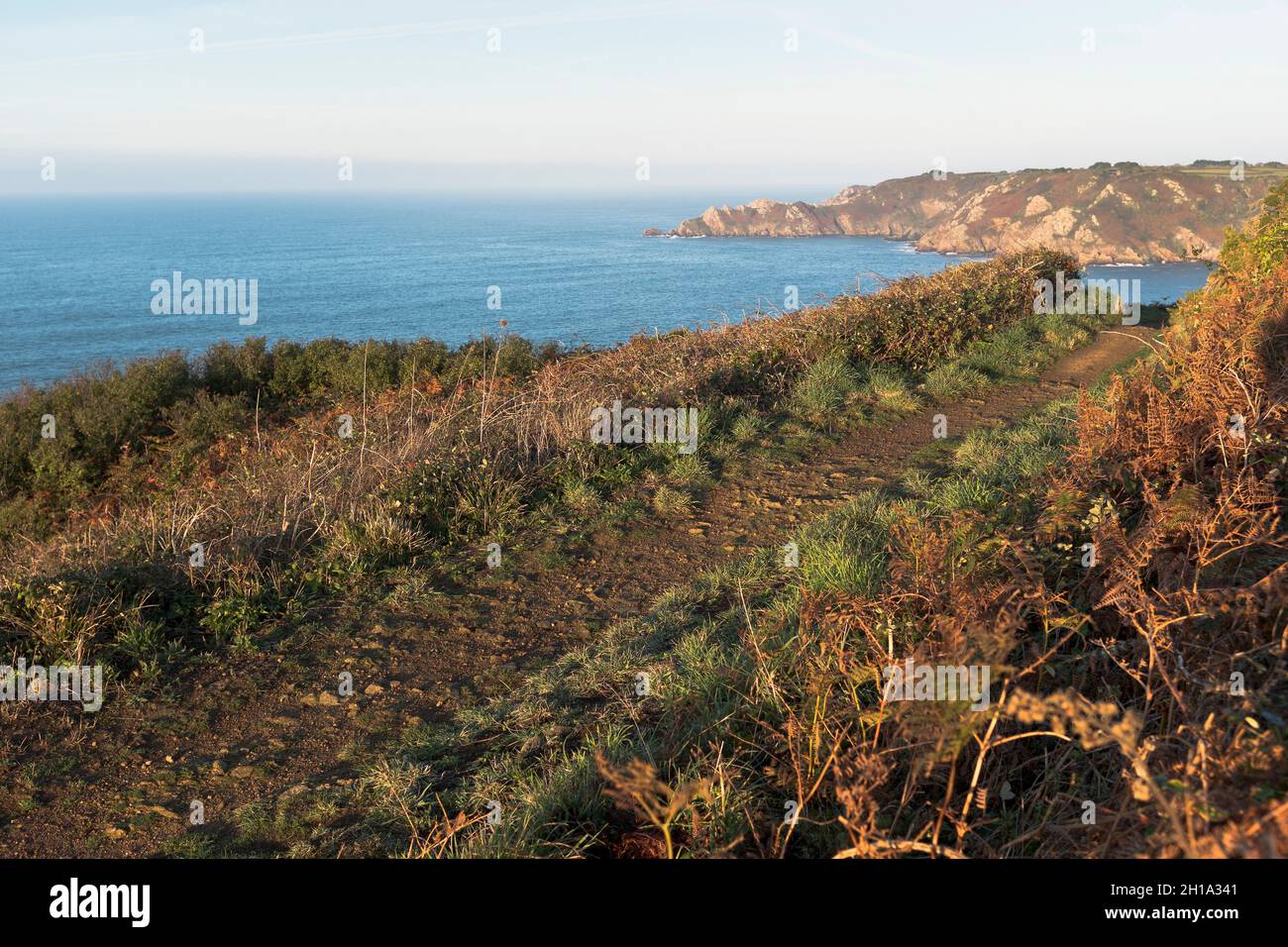 dh Icart point ST MARTIN GUERNSEY Early morning footpath Saint Martins south coast cliff path walk trail Stock Photo