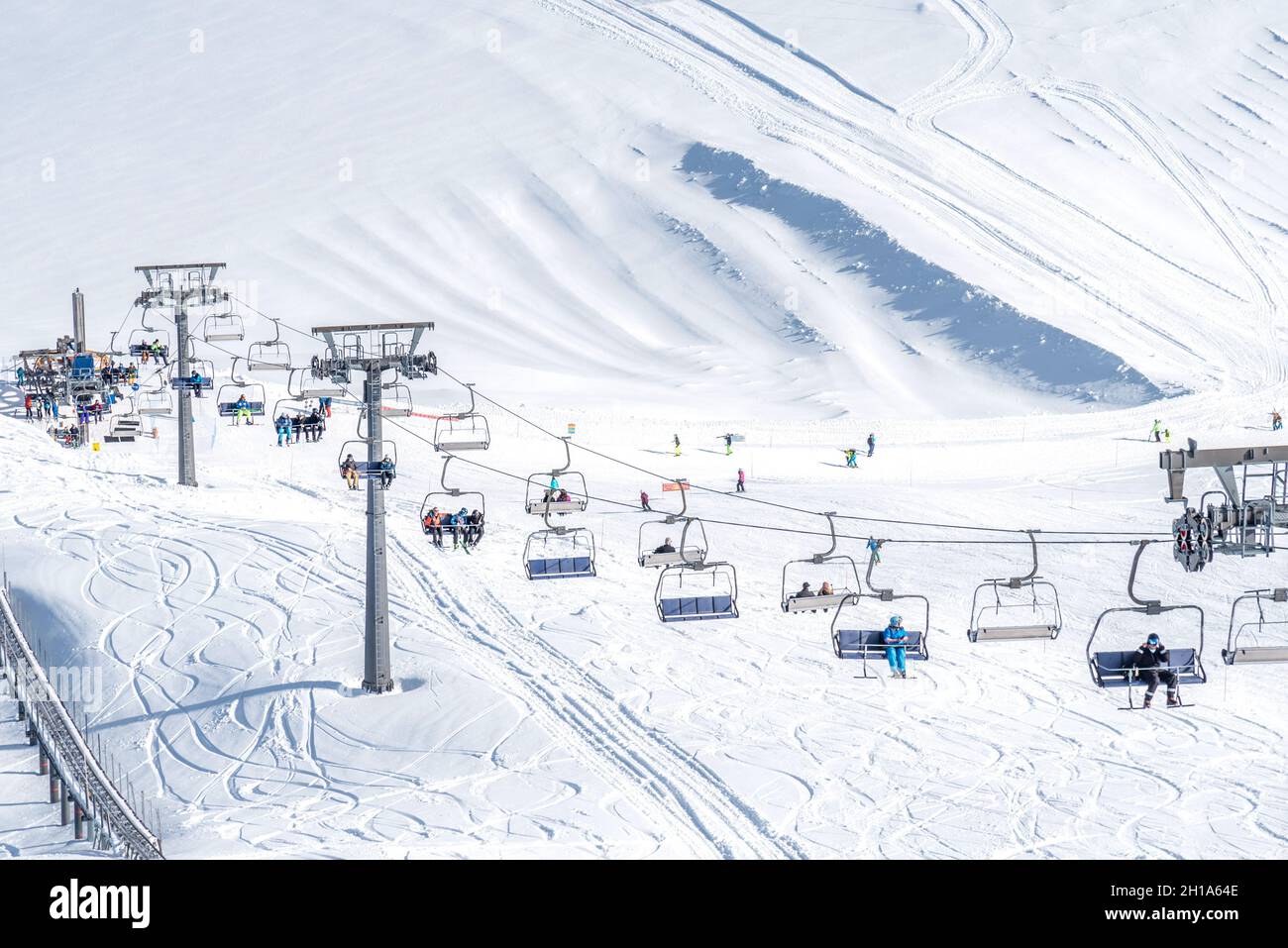 Chairlifts in Diablerets glacier at 3000 meters above sea level in Switzerland in a winter day Stock Photo