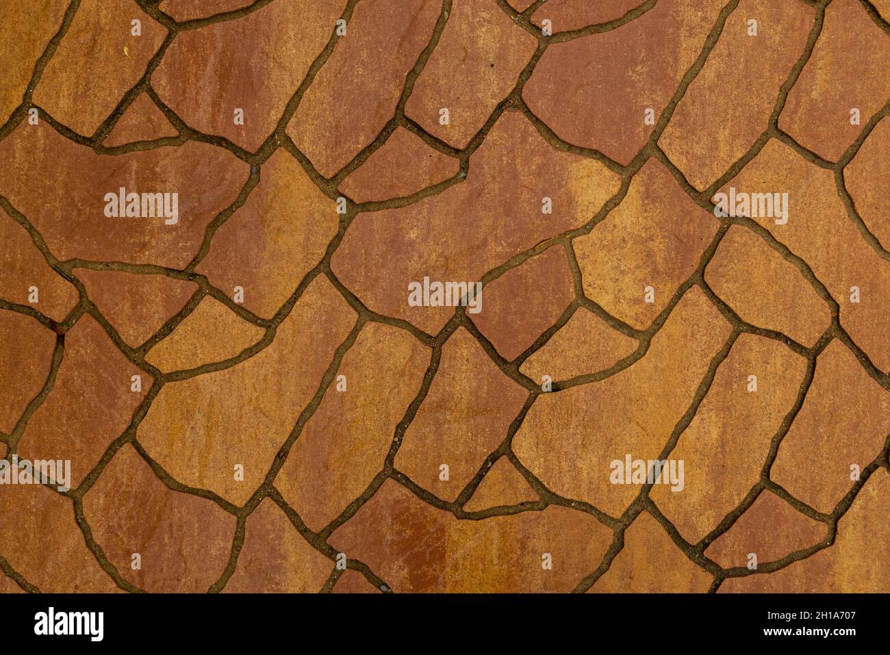 Stencilled artificial stone floor pavement texture and background Stock Photo