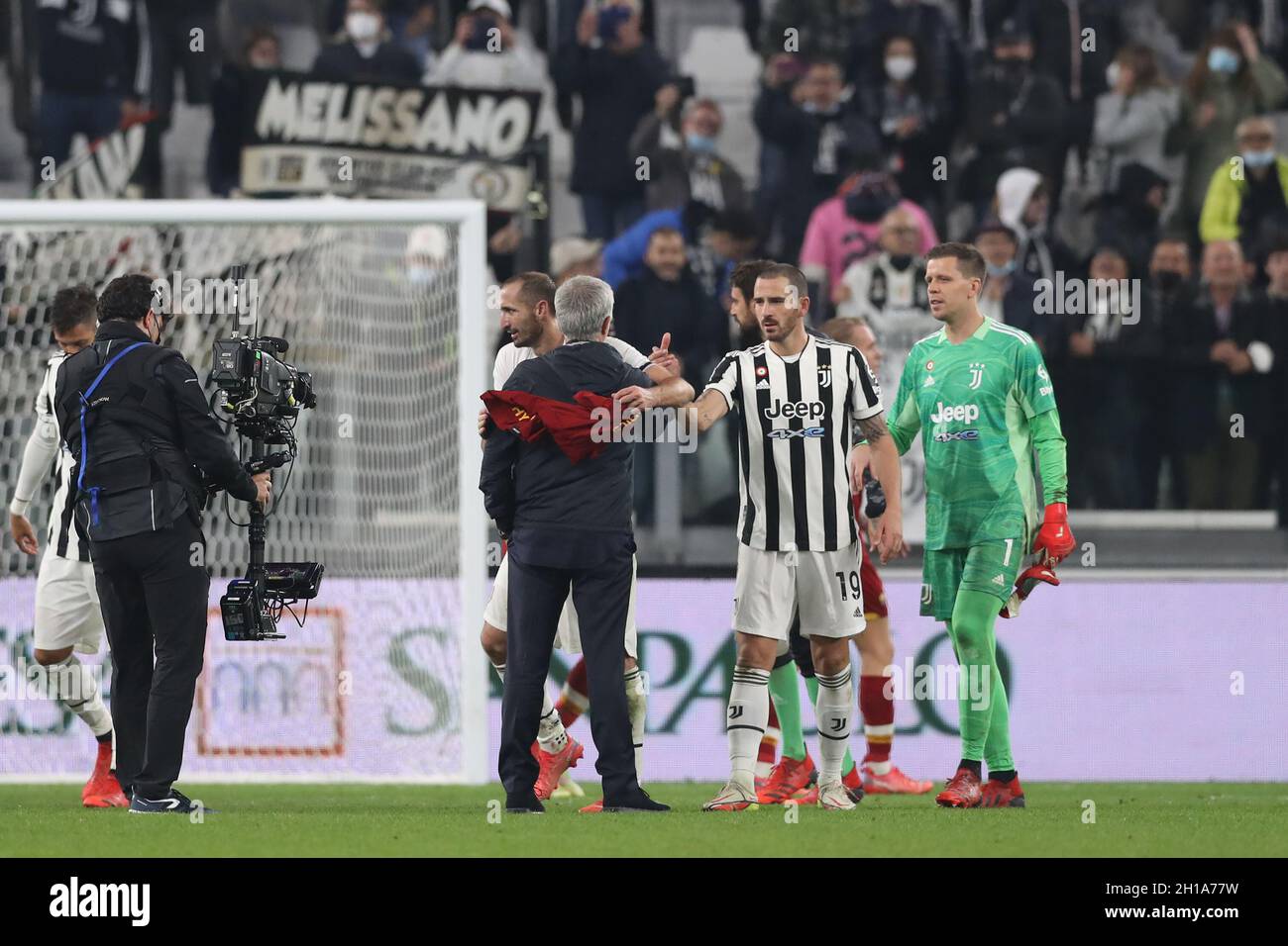 Turin, Italy. 17th Oct, 2021. Wojciech Szczesny of Juventus looks on as Jose Mourinho Head coach of AS Roma shakes hands with Leonardo Bonucci of Juventus as he is embraced by Giorgio Chiellini of Juventus following the final whistle of the Serie A match at Allianz Stadium, Turin. Picture credit should read: Jonathan Moscrop/Sportimage Credit: Sportimage/Alamy Live News Stock Photo
