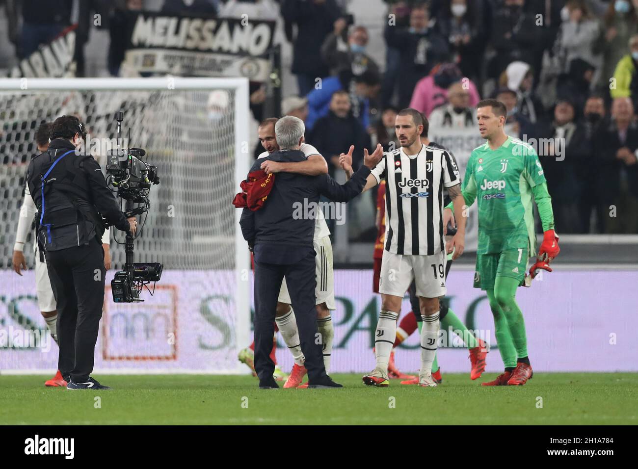 Turin, Italy. 17th Oct, 2021. Wojciech Szczesny of Juventus looks on as Jose Mourinho Head coach of AS Roma shakes hands with Leonardo Bonucci of Juventus as he is embraced by Giorgio Chiellini of Juventus following the final whistle of the Serie A match at Allianz Stadium, Turin. Picture credit should read: Jonathan Moscrop/Sportimage Credit: Sportimage/Alamy Live News Stock Photo