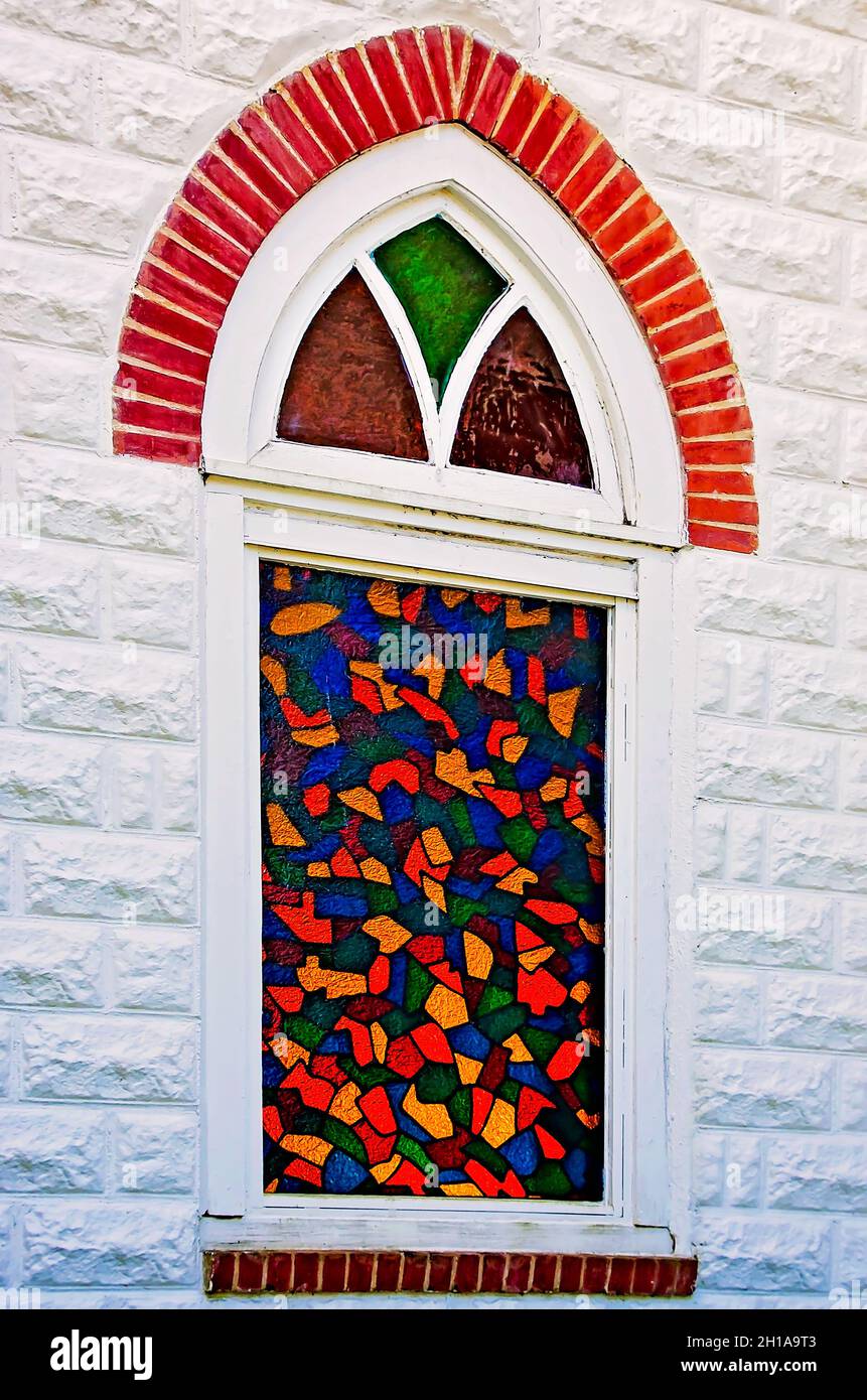 A stained glass window at Twin Beech AME Zion Church is pictured, Oct. 16, 2021, in Fairhope, Alabama. The church was built in 1925. Stock Photo
