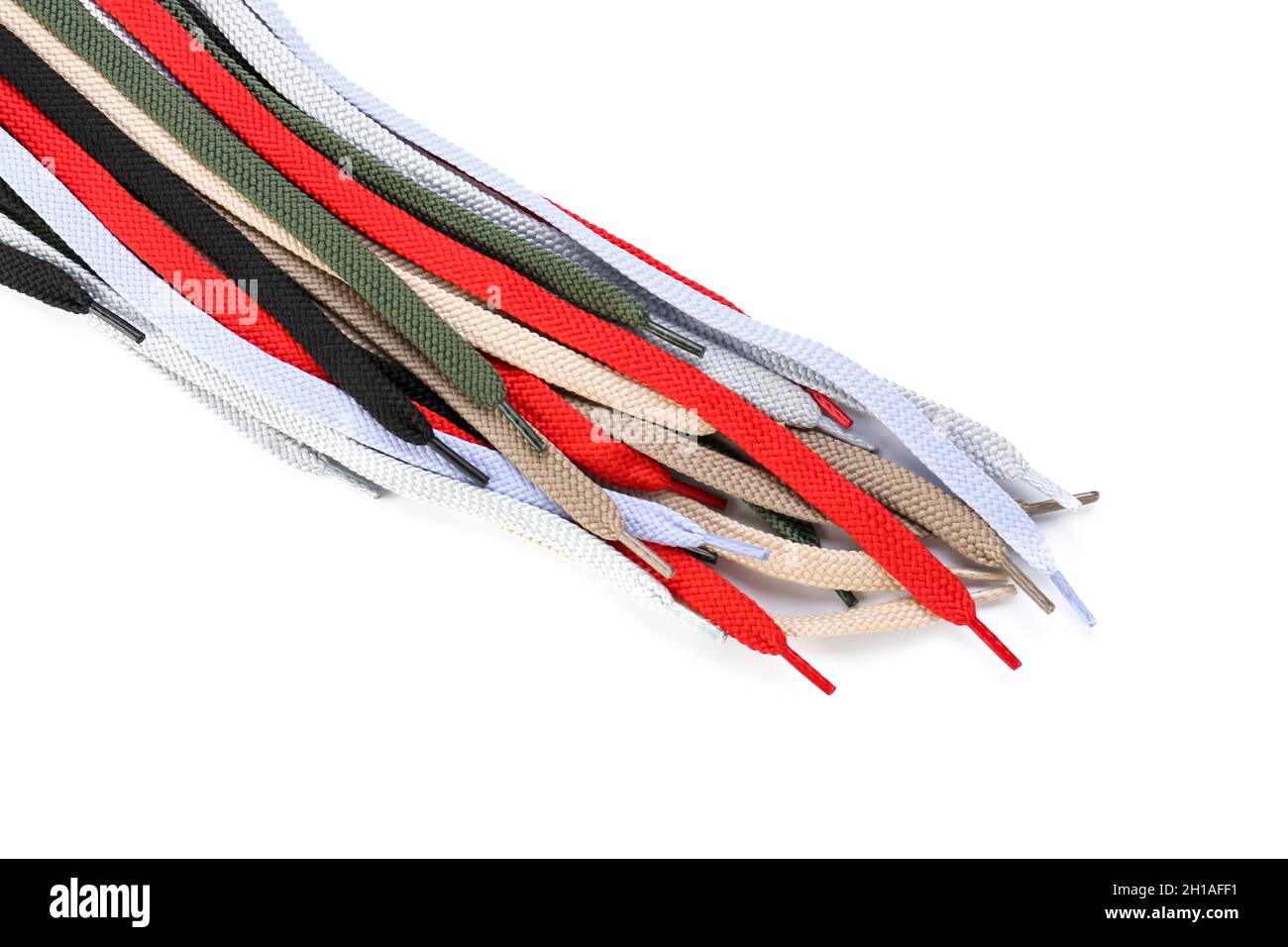 Many shoe laces on white background Stock Photo - Alamy