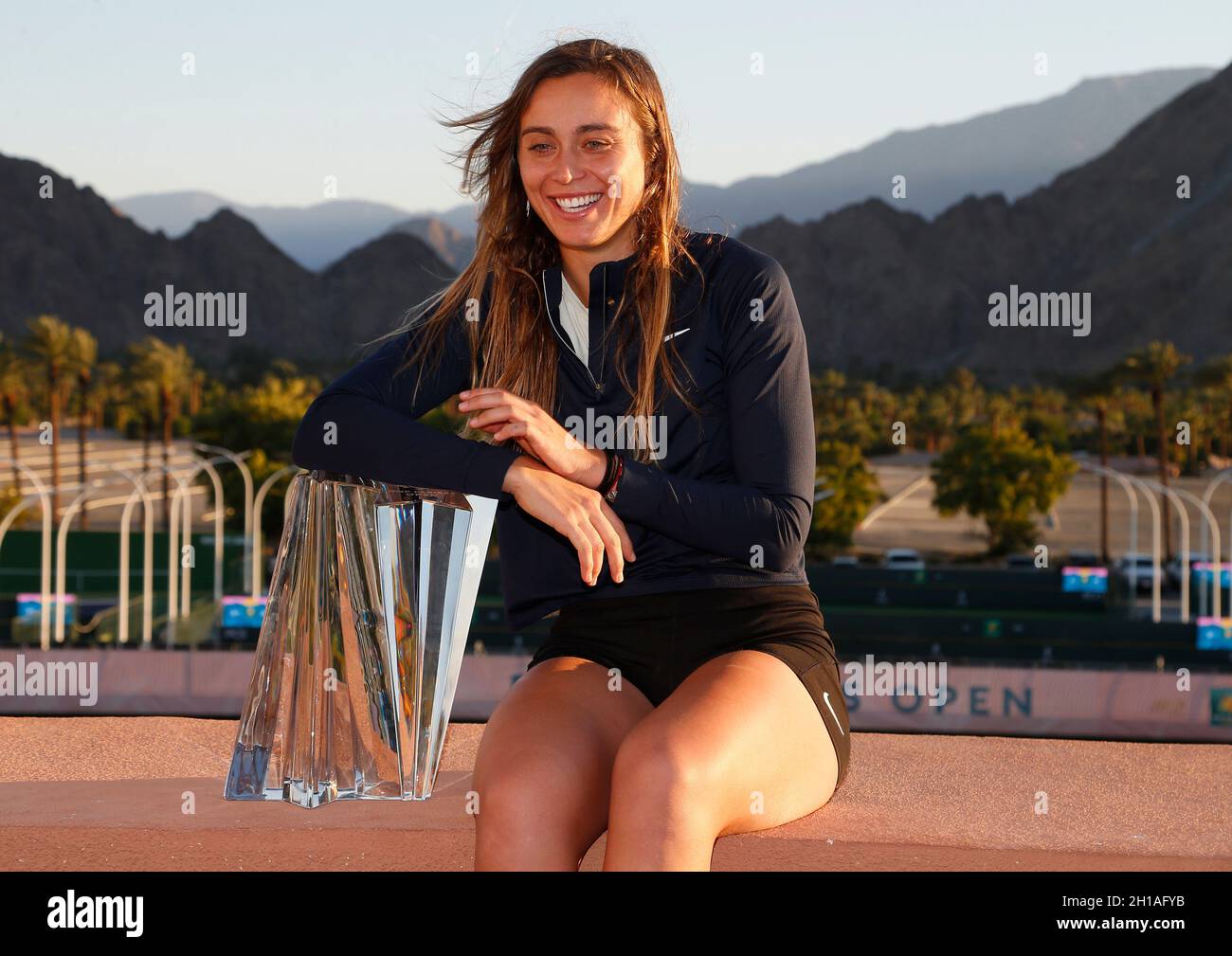 Indian Wells, California, USA. October 17, 2021 Paula Badosa of Spain poses for photographers after defeating Victoria Azarenka of Belarus during the final of the 2021 BNP Paribas Open at Indian Wells Tennis Garden in Indian Wells, California. Mandatory Photo Credit : Charles Baus/CSM Stock Photo