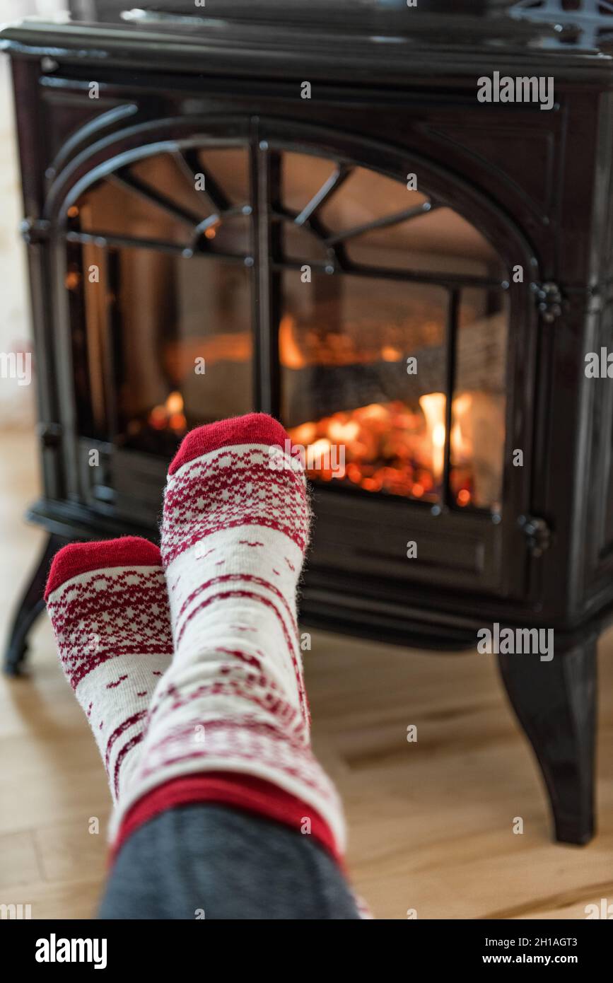 Close Image Woman Sitting Blanket Cozy Fireplace Warming Her Feet