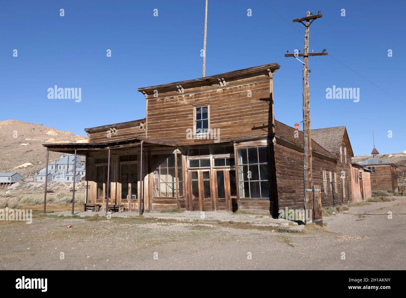 The Wheaton and Hollis Hotel sits at the corner of Main and Green in Bodie State Park. Stock Photo