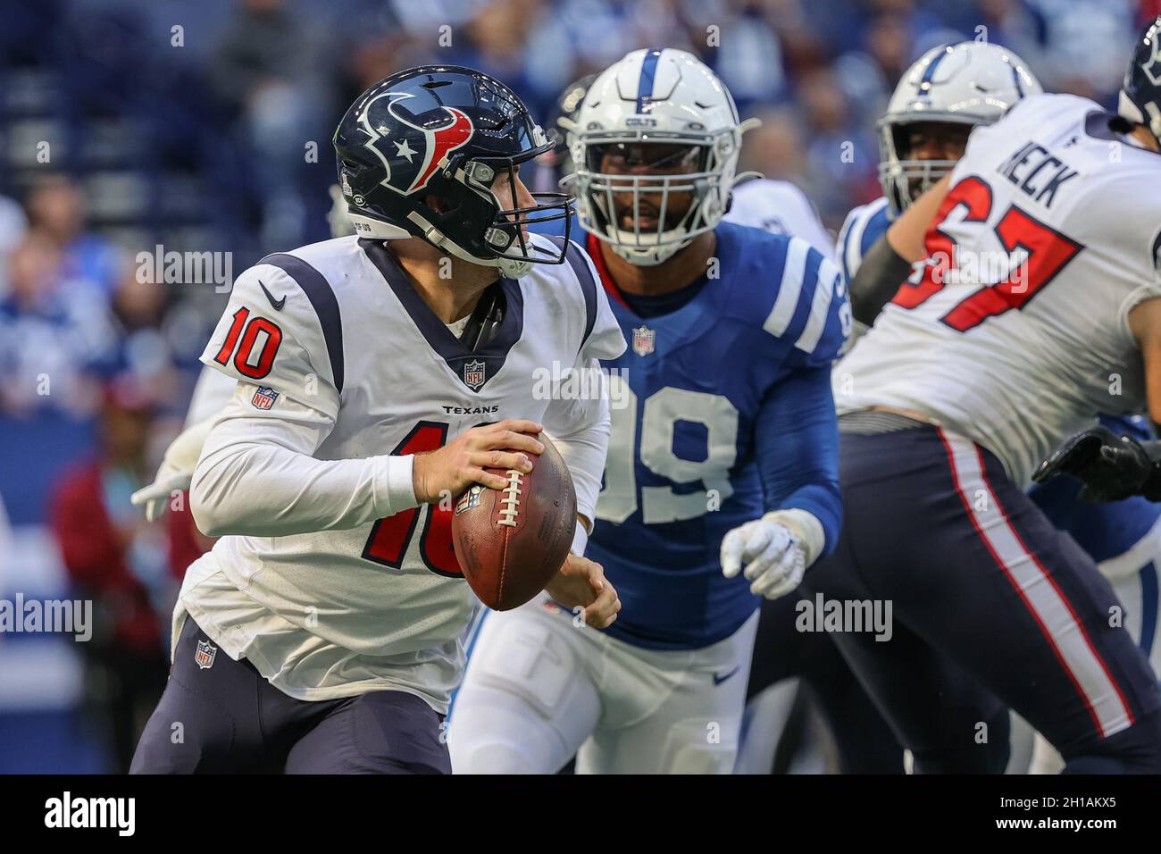 Indianapolis, Indiana, USA. 8th Jan, 2023. Indianapolis Colts safety Rodney  McLeod (26) fights off a tackle by Houston Texans quarterback Davis Mills  (10) after intercepting his pass during the game between the