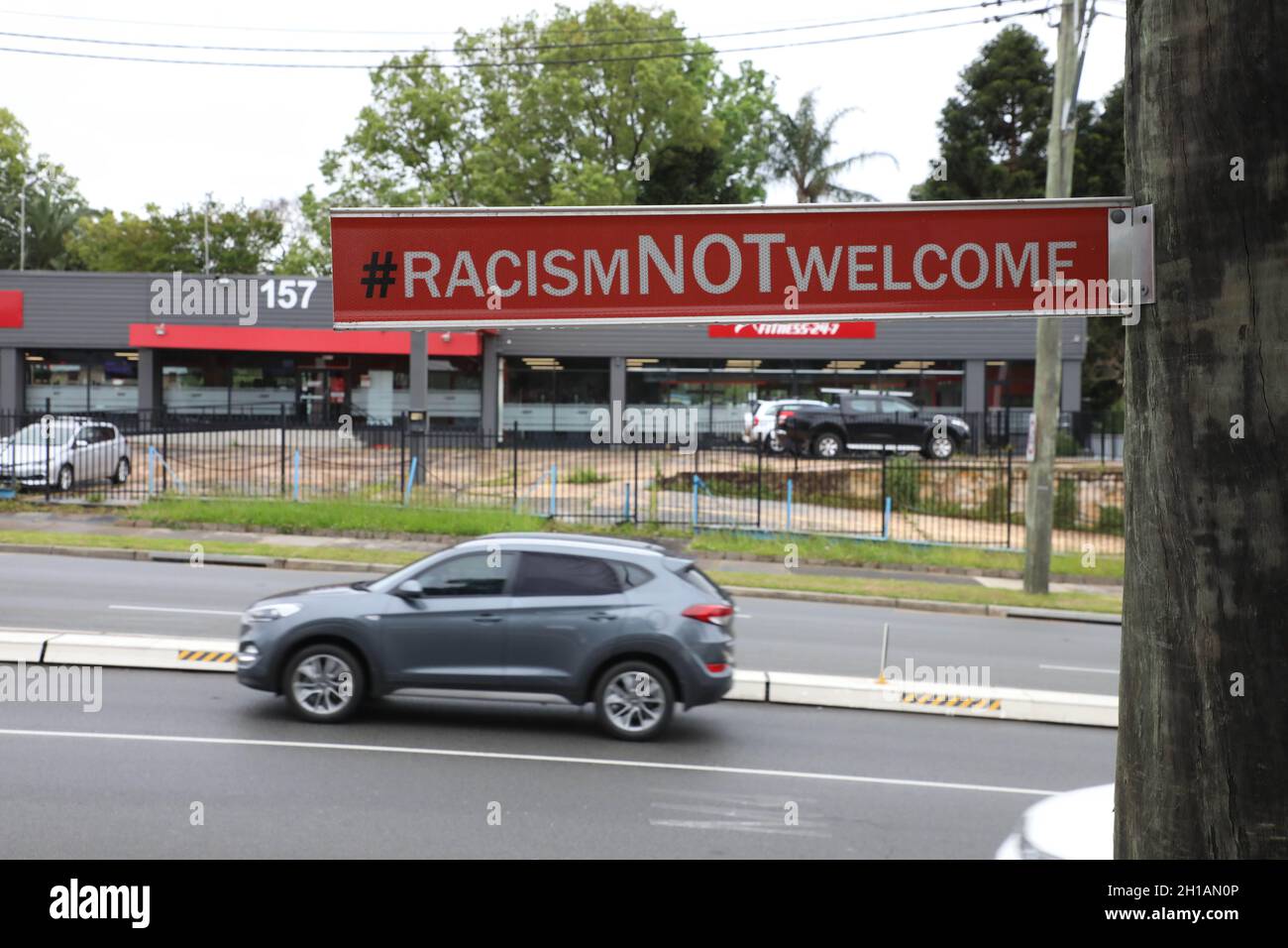 Racism Not Welcome sign on the Parramatta Road, Ashfield. Stock Photo