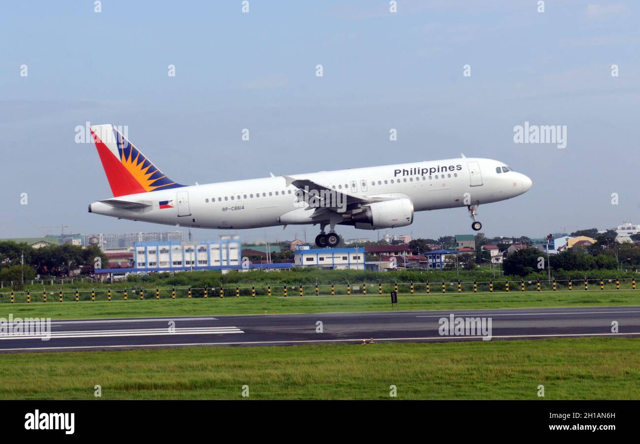 Philippines Airlines airplane landing at Ninoy Aquino International Airport in Manila, Philippines. Stock Photo