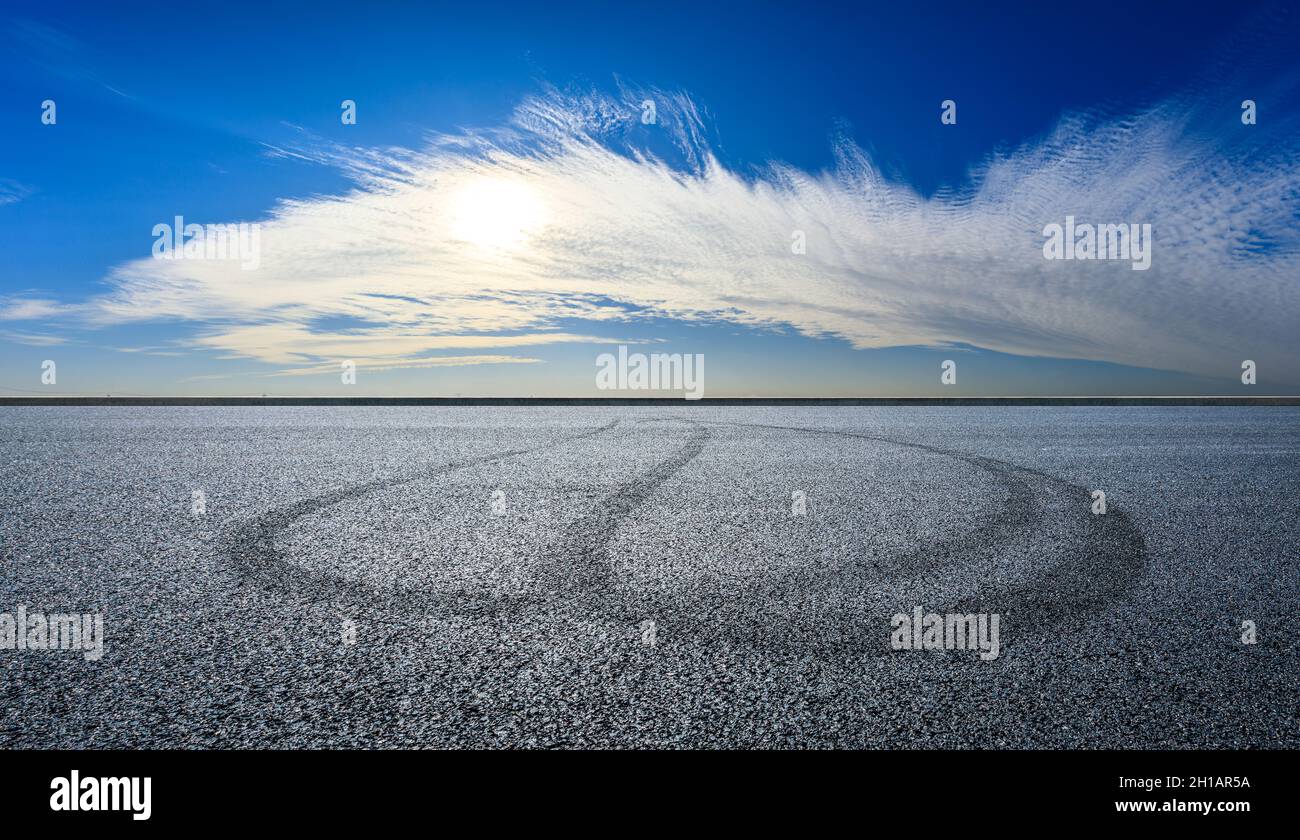 Asphalt race track road and sky clouds.Road ground background Stock ...