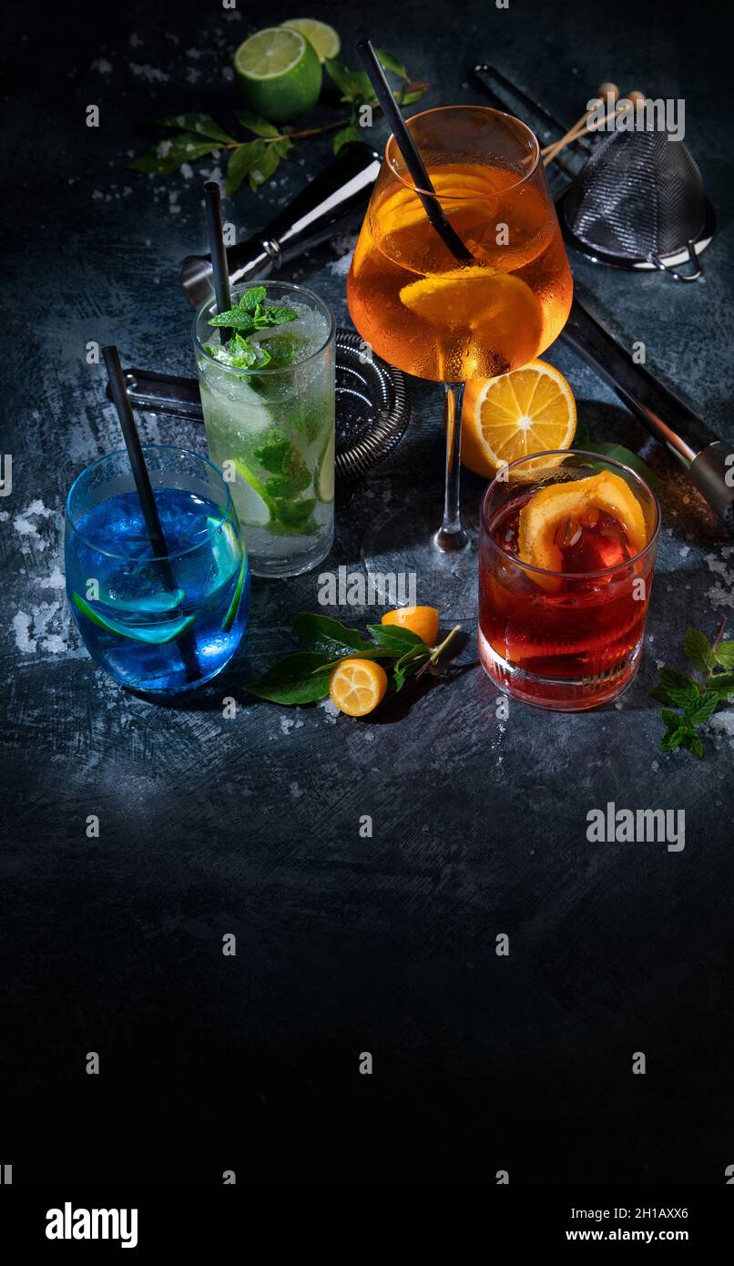Cocktails assortment served on dark background. Classic drink menu concept.  Copy space Stock Photo - Alamy
