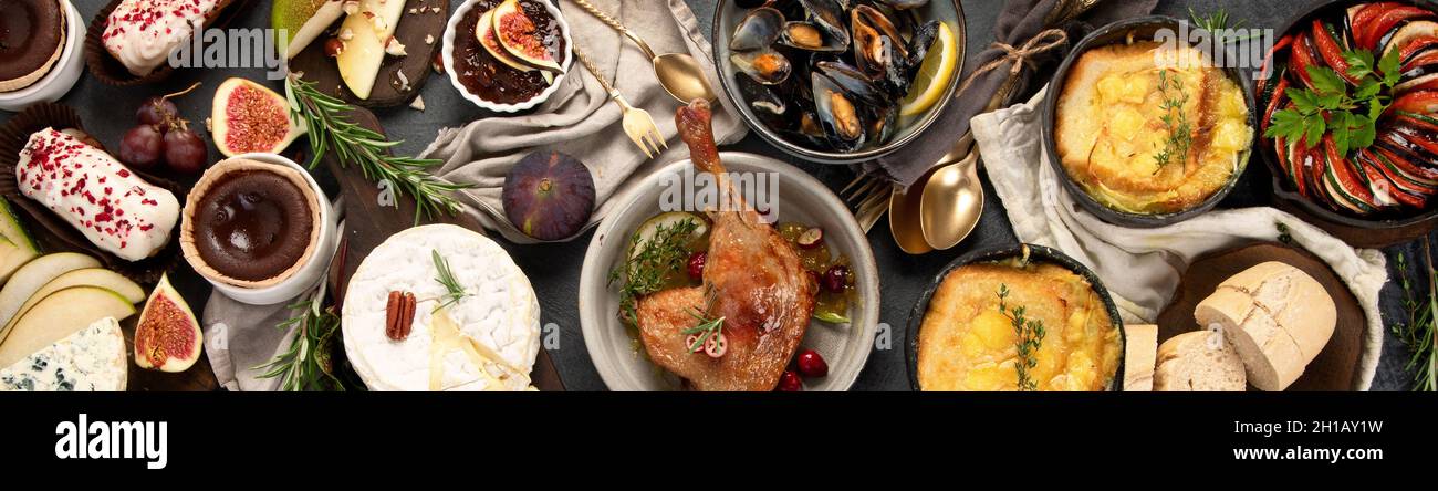 French food assortment on dark background. Traditional cuisine concept. Top  view, flat lay, panorama Stock Photo - Alamy