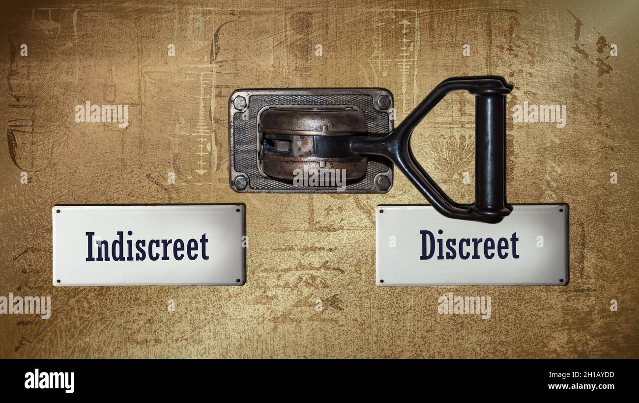 Street Sign the Direction Way to Discreet versus Indiscreet Stock Photo ...