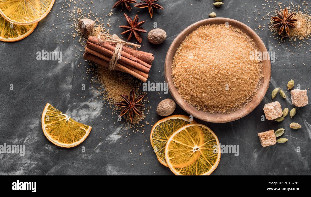 A set of spices for mulled wine. Cinnamon sticks, anise stars, nutmeg, brown sugar. Copy space. Stock Photo