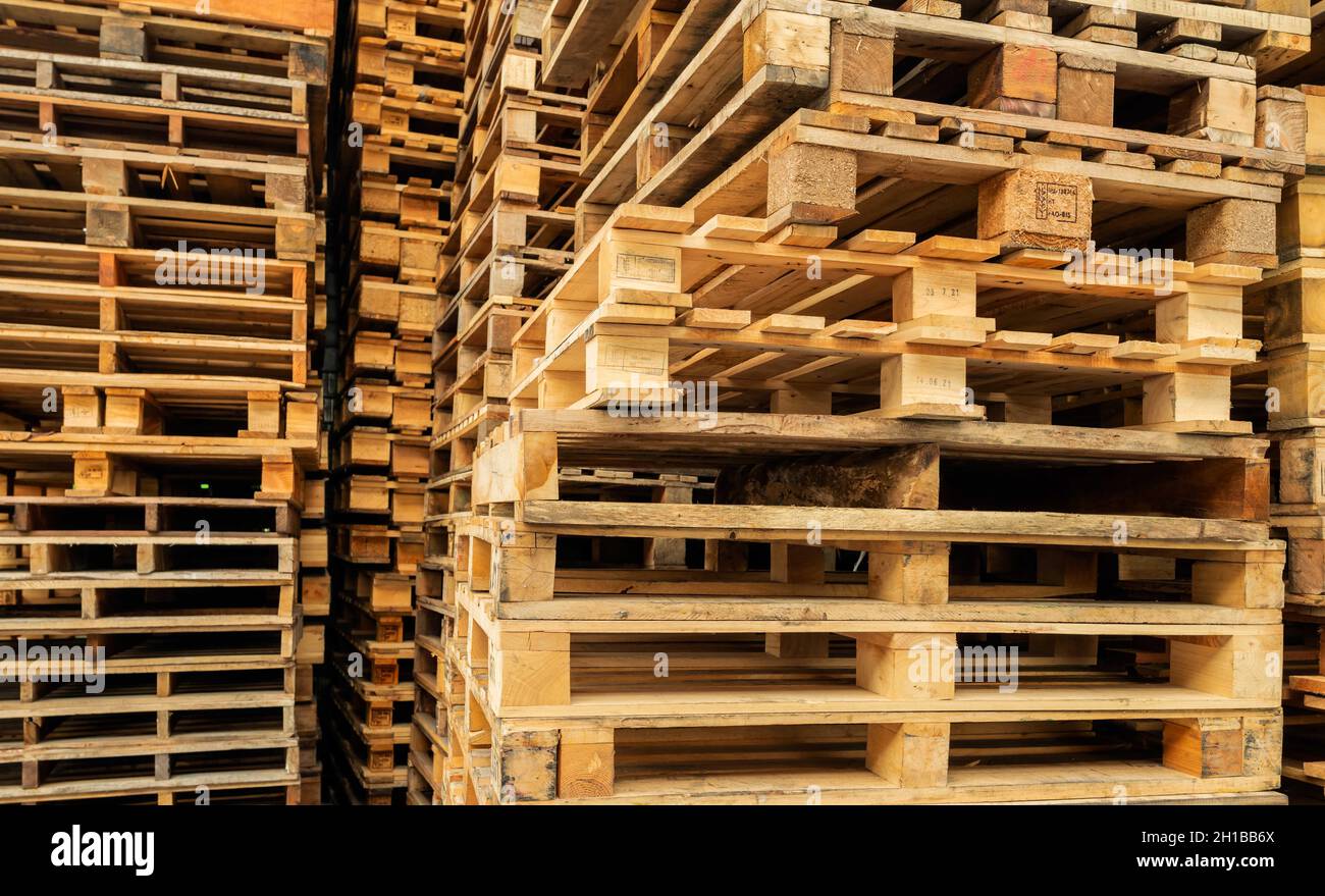 Stack of wooden pallet. Industrial wood pallet at factory warehouse