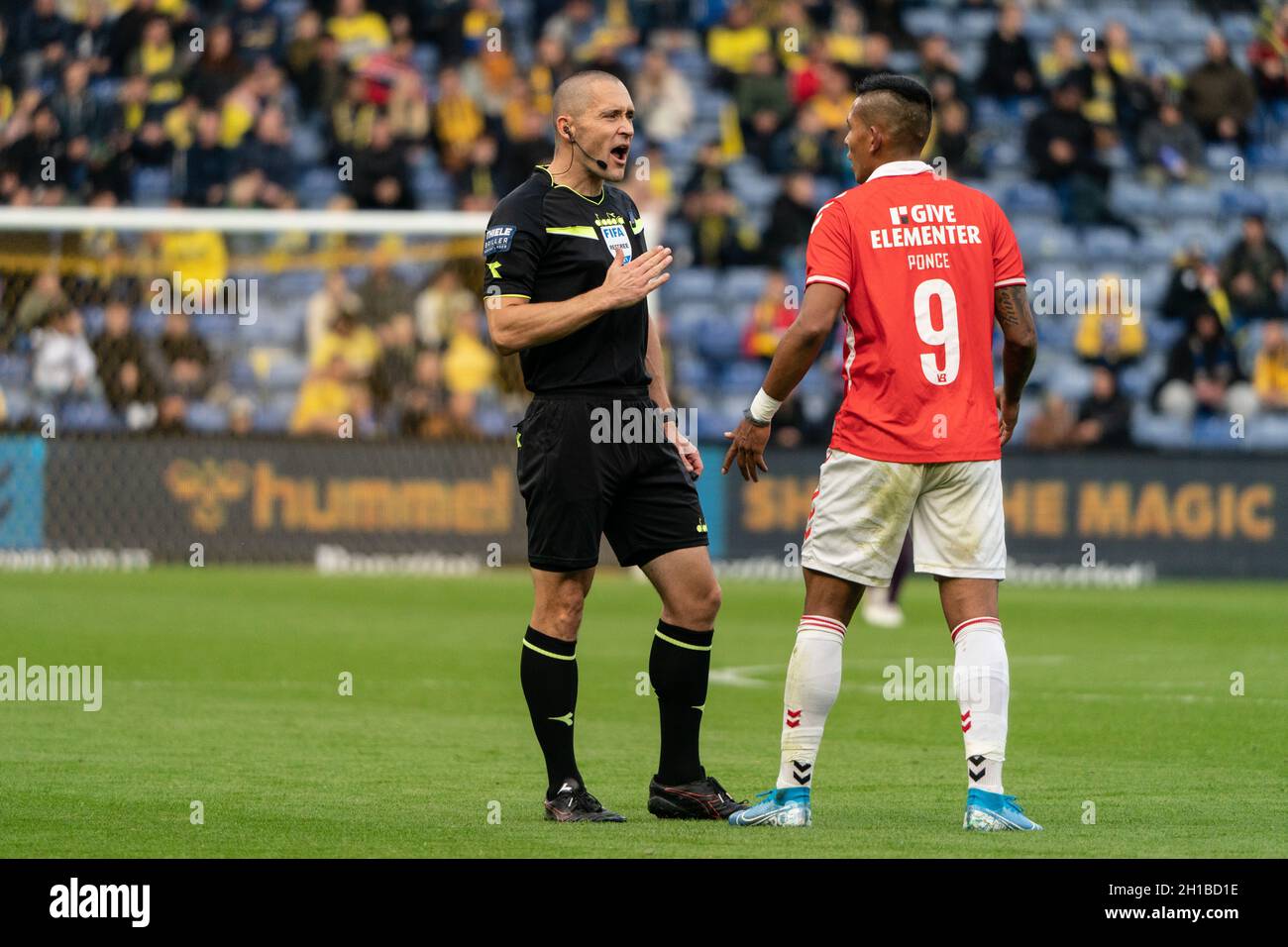 Brondby, Denmark. , . Referee Mads-Kristoffer Kristoffersen seen with Andres Ponce (9) of Vejle Boldklub during the 3F Superliga match between Broendby IF and Vejle Boldklub at Brondby Stadion. (Photo Credit: Gonzales Photo/Alamy Live News Stock Photo