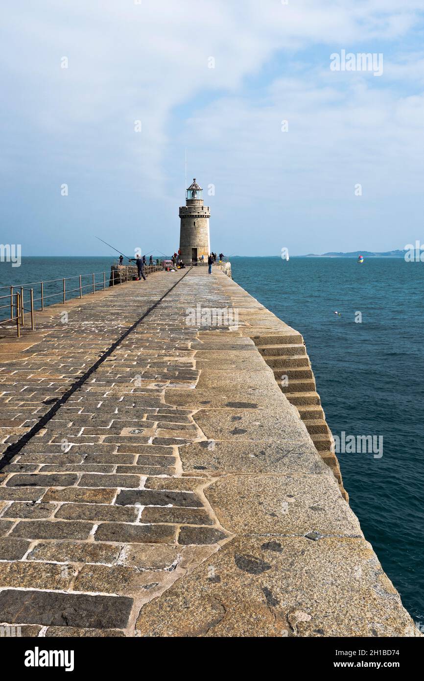 dh Castle Breakwater Lighthouse ST PETER PORT GUERNSEY Piers granite stone harbour tower pier lighthouses Stock Photo