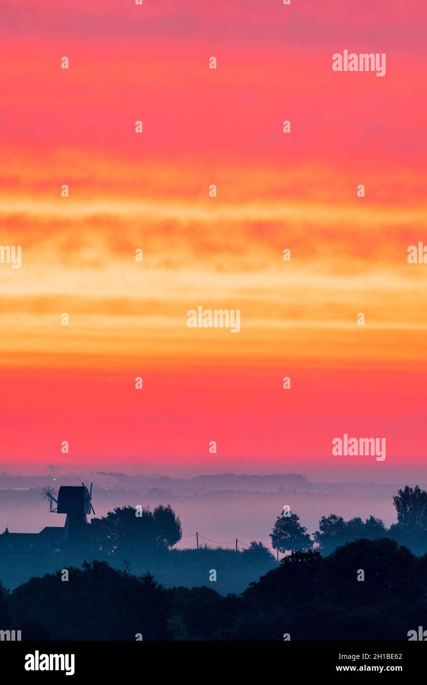 Very dramatic dawn sky over a mist covered Kent Landscape with some ...