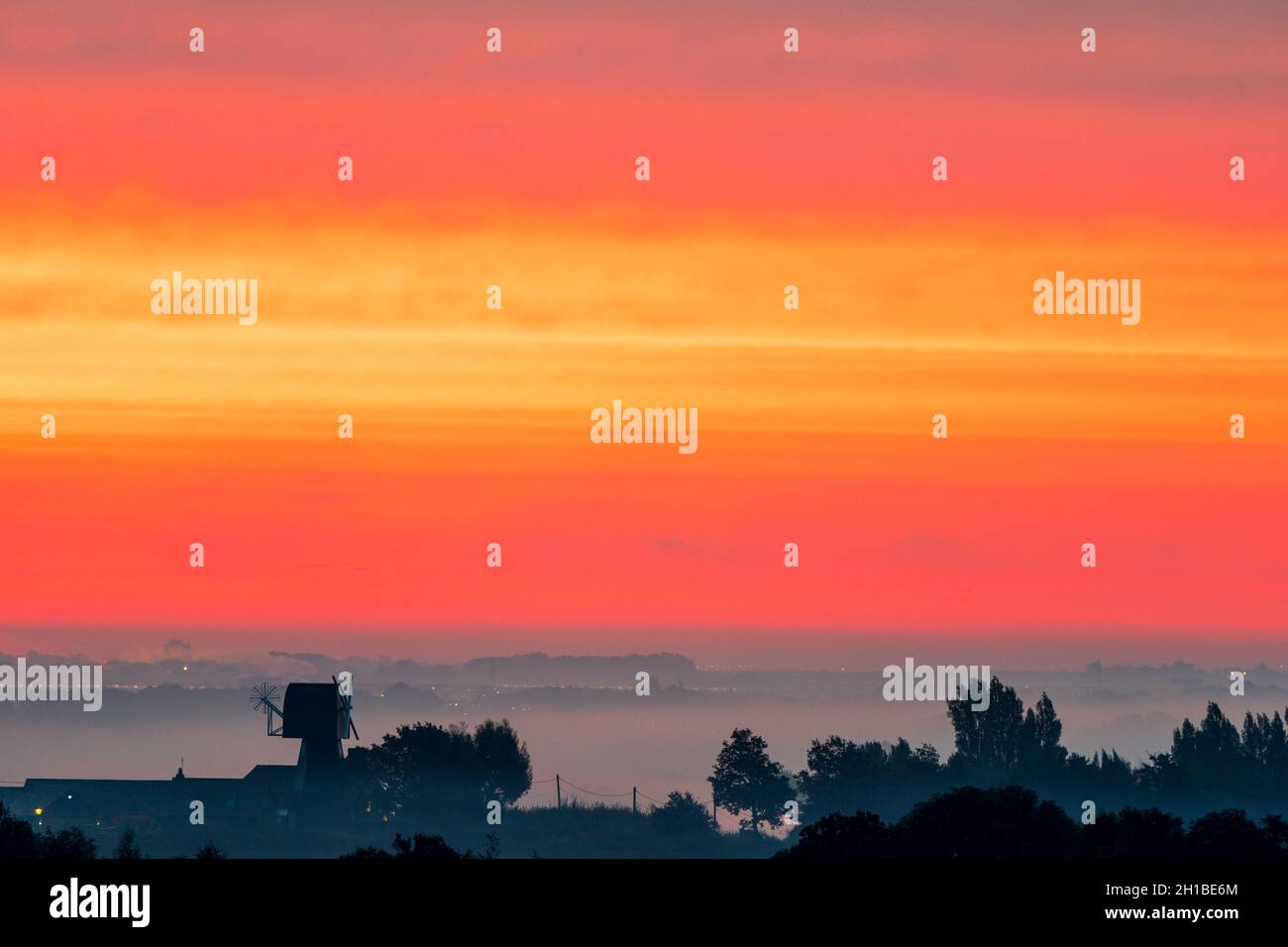 Very dramatic dawn sky over a mist covered Kent Landscape with some ...