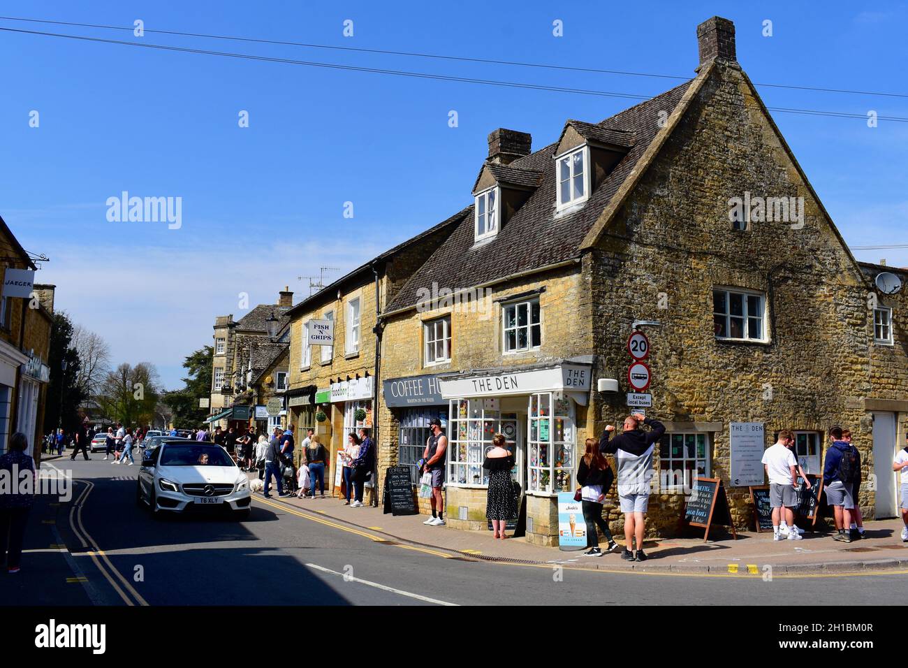A view of the shops and cafés along part of the High Street in the