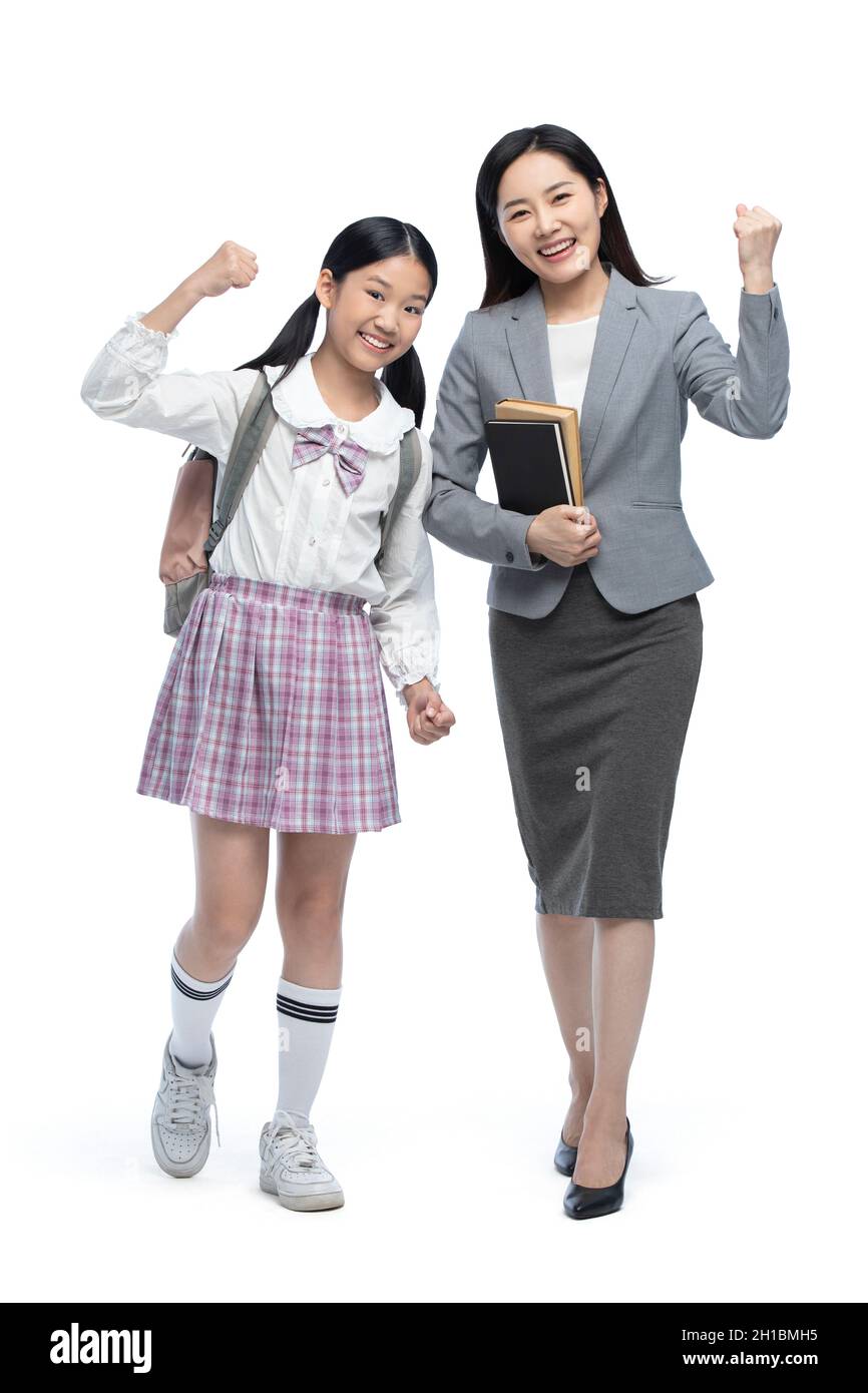 Cheerful teacher and student cheering Stock Photo - Alamy