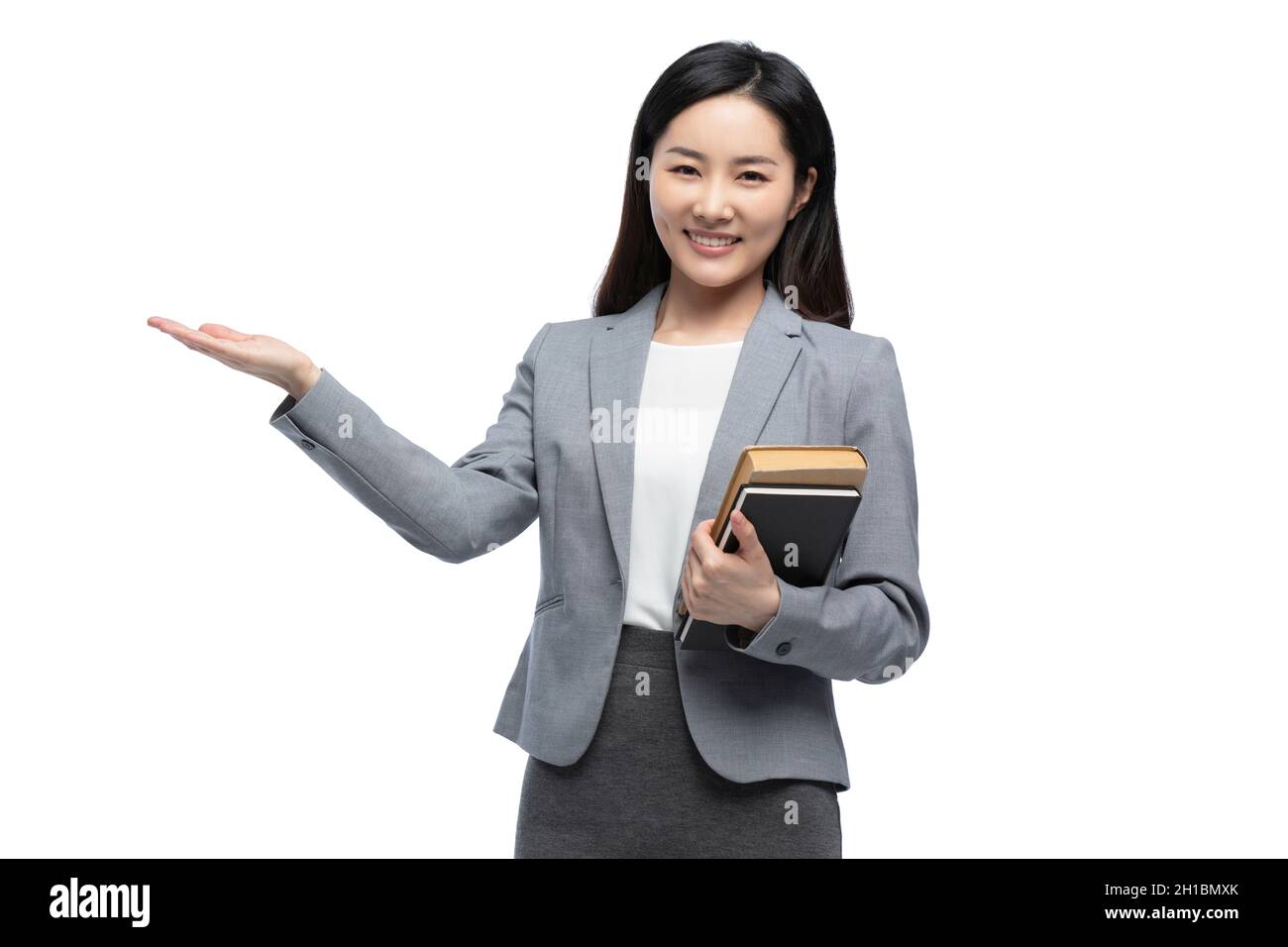 Portrait of smiling female teacher Stock Photo - Alamy