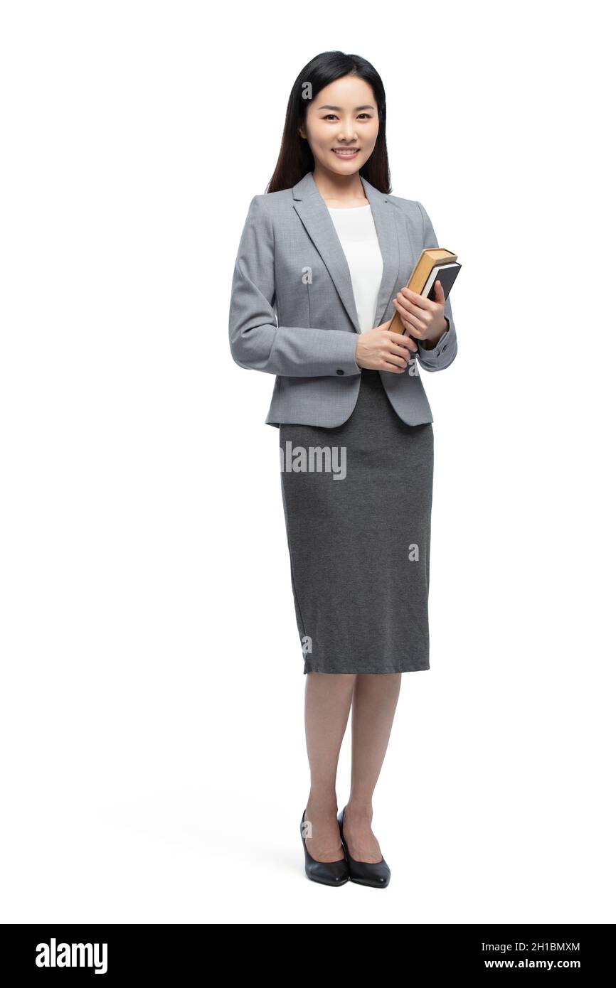 Portrait of smiling female teacher Stock Photo - Alamy