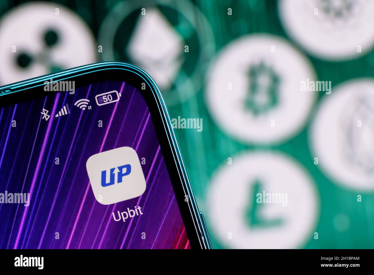 Upbit is South Korean cryptocurrency exchange. Upbit app on smartphone  screen against the background of the main cryptocurrencies Stock Photo -  Alamy
