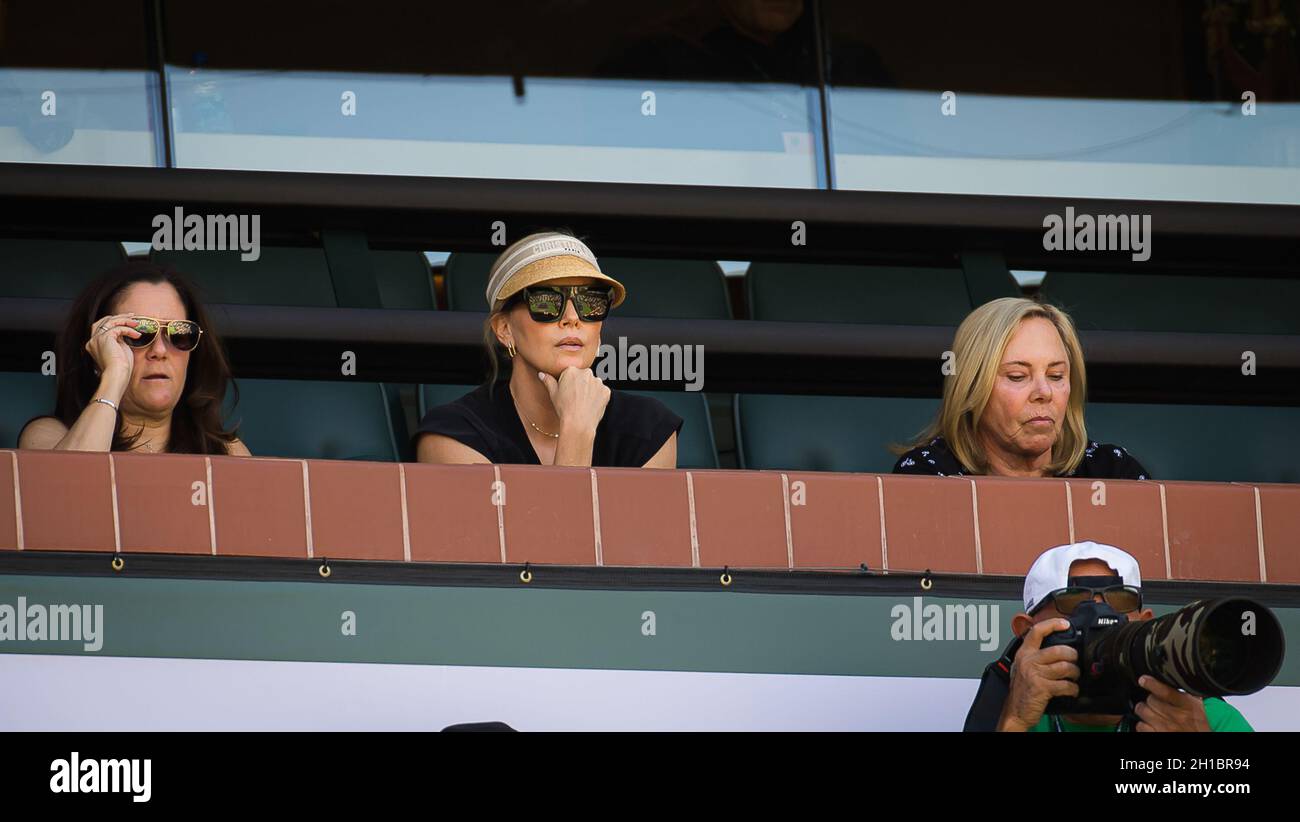 Charlize Theron watches the doubles final of the 2021 BNP Paribas Open