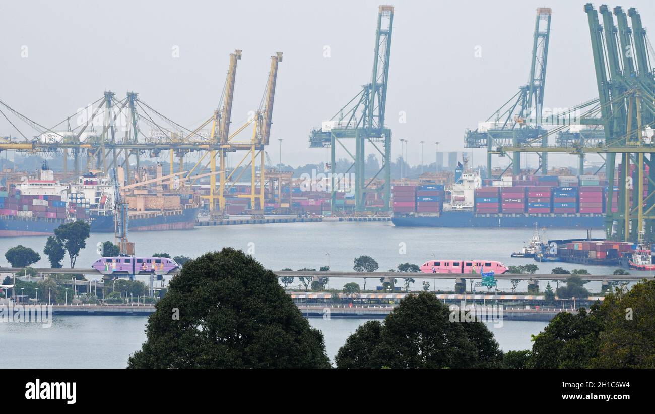 (211018) -- SINGAPORE, Oct. 18, 2021 (Xinhua) -- Photo taken on Oct. 12, 2021 shows a view of the Tanjong Pagar container terminal in Singapore.  Singapore's non-oil domestic exports (NODX) grew for the 10th consecutive month in September, and the year-on-year growth expanded from 2.7 percent in August to 12.3 percent, Enterprise Singapore, a government agency, announced on Oct. 18. (Photo by Then Chih Wey/Xinhua) Stock Photo