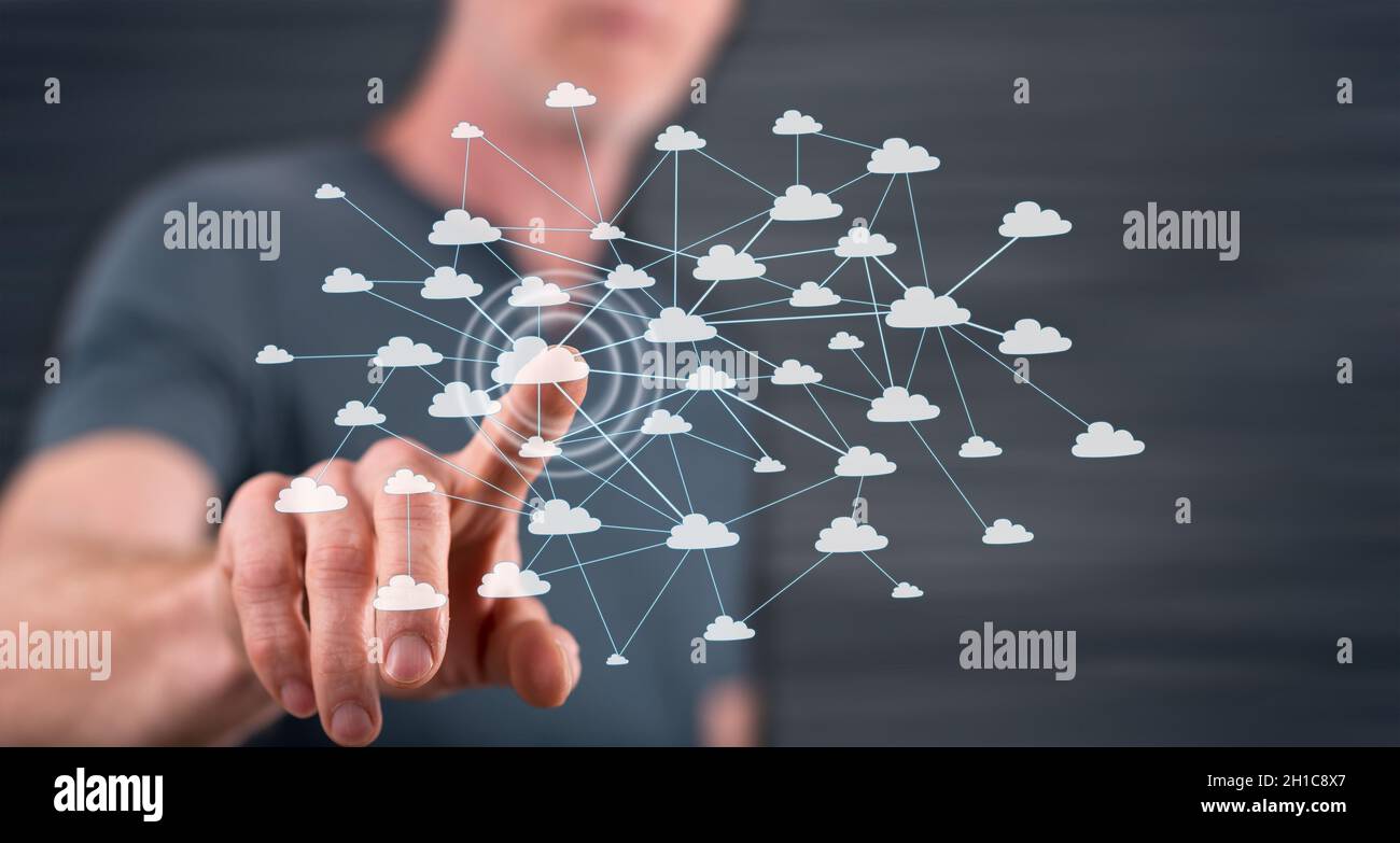 Man touching a cloud network on a touch screen with his finger Stock ...