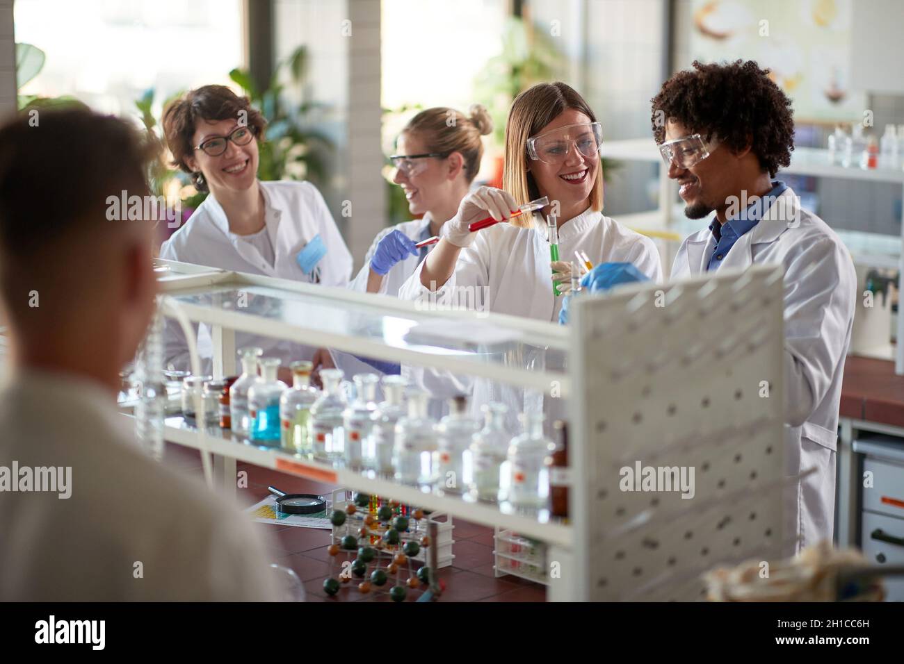Medical workers in lab testing sample on cov Stock Photo - Alamy