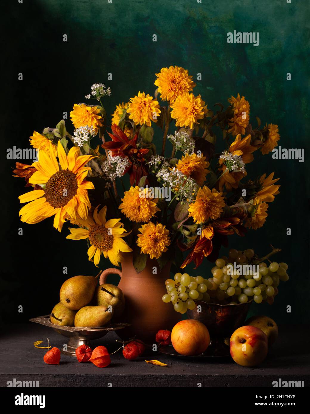 Classic still life with a bouquet of autumn flowers and fruits Stock ...