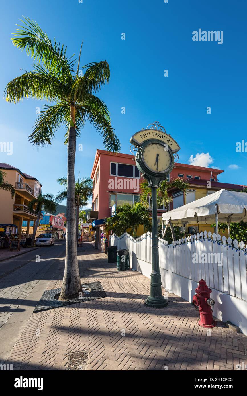 Philipsburg, St. Maarten - December 17, 2018: Street clock in front of the Philipsburg Methodist Church in island of Sint Maarten - Saint Martin, Neth Stock Photo