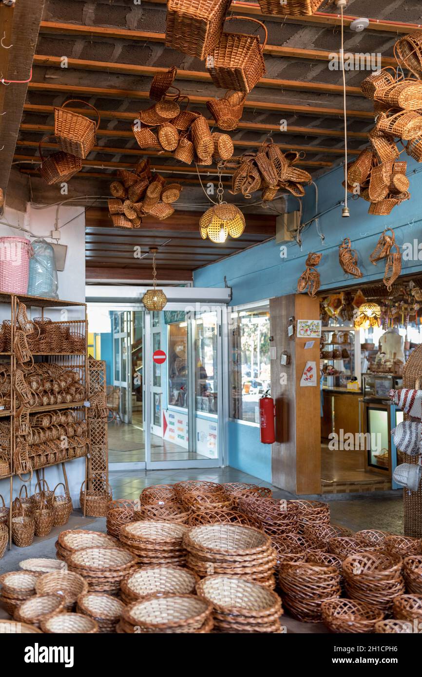 Camacha, Madeira, Portugal - April 19, 2018: Wicker baskets on sale in a factory shop in Camacha on Madeira Island. Portugal Stock Photo