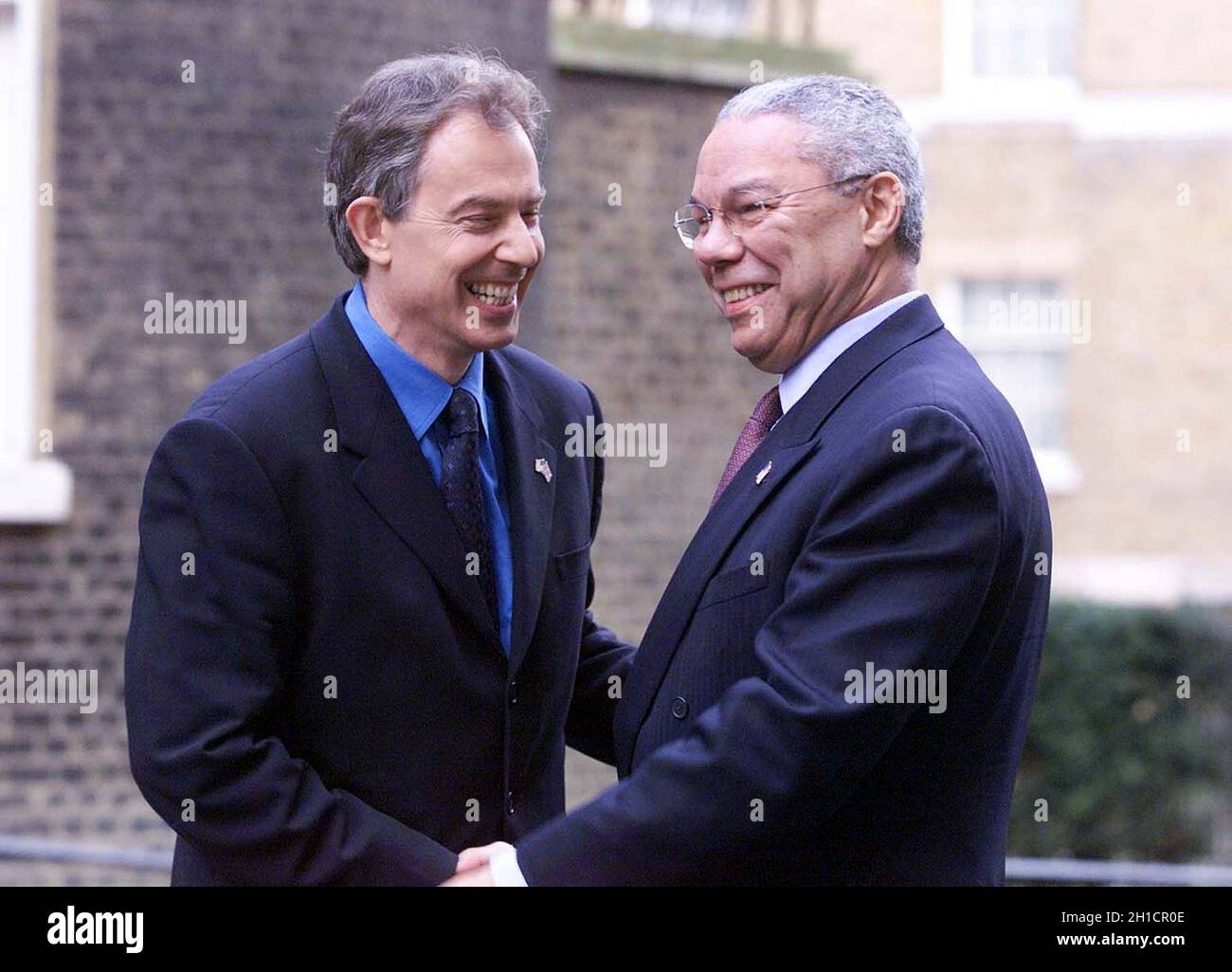 File photo dated 11/12/01 of the then Prime Minister Tony Blair (left) greeting US Secretary of State Colin Powell outside 10 Downing Street in central London, ahead of a ceremony to mark three months since the September 11 terrorist attacks in New York and Washington DC. Colin Powell, the former US Joint Chiefs chairman and US secretary of state, has died from Covid-19 complications, his family has said. Issue date: Monday October 18, 2021. Stock Photo
